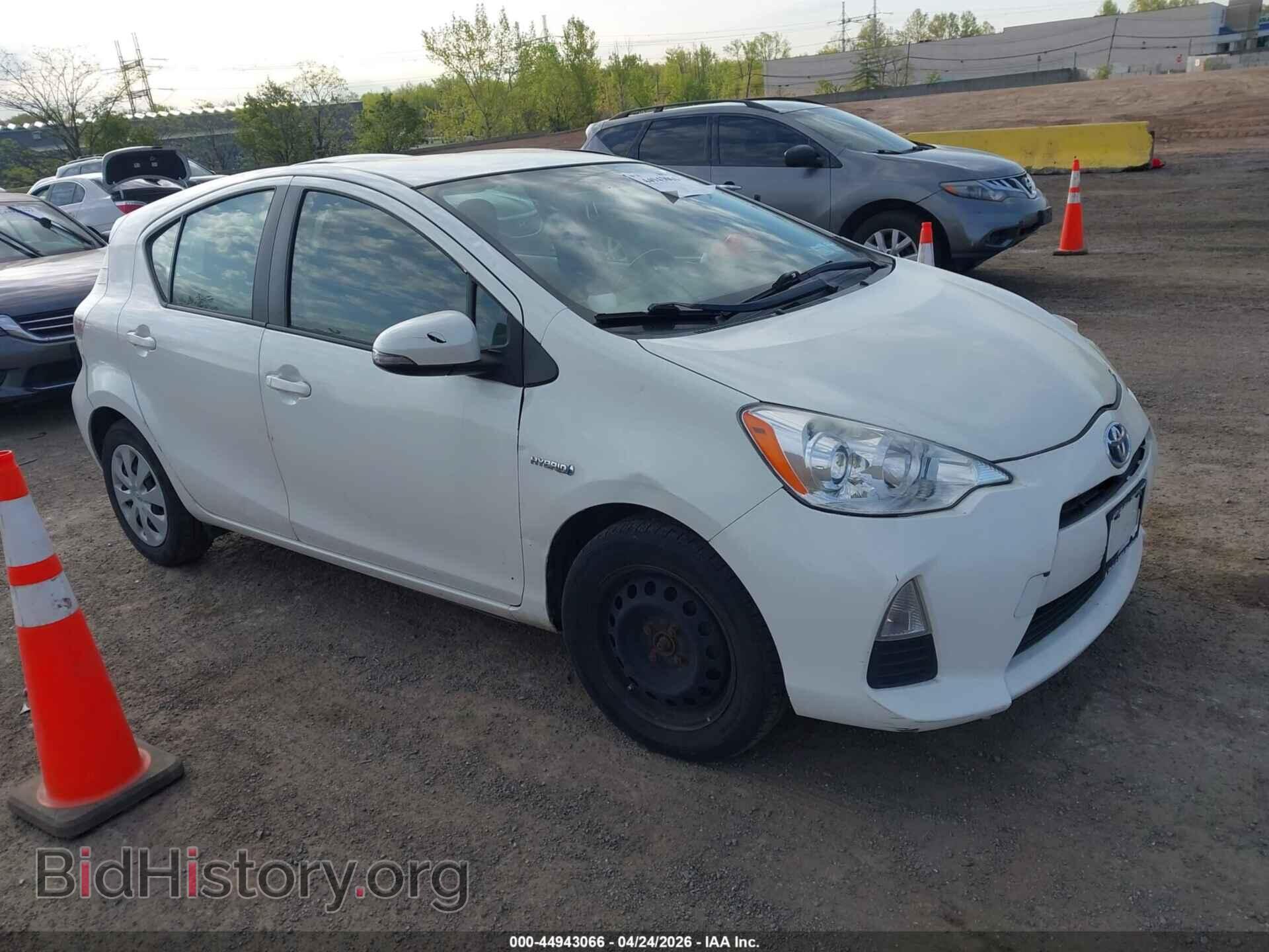 Фотография JTDKDTB32E1071773 - TOYOTA PRIUS C 2014