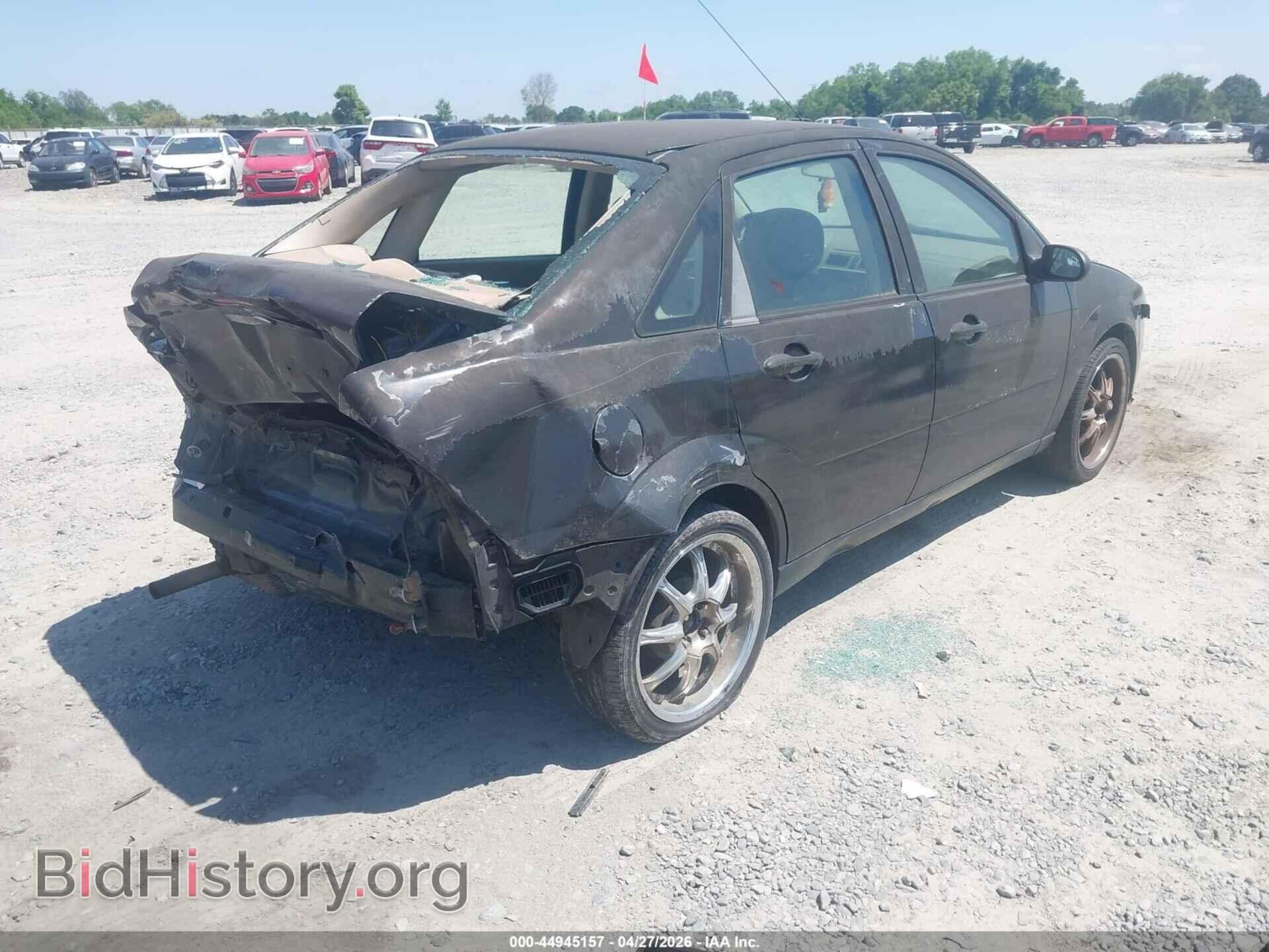 2007 FORD FOCUS - VIN: 1FAFP34N97W200059 - Photo 4