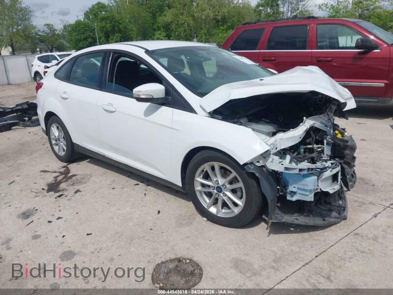 2016 Ford FOCUS SE (VIN 1FADP3F27GL310152) — photo 1 of 17, IAAI, damage: front end