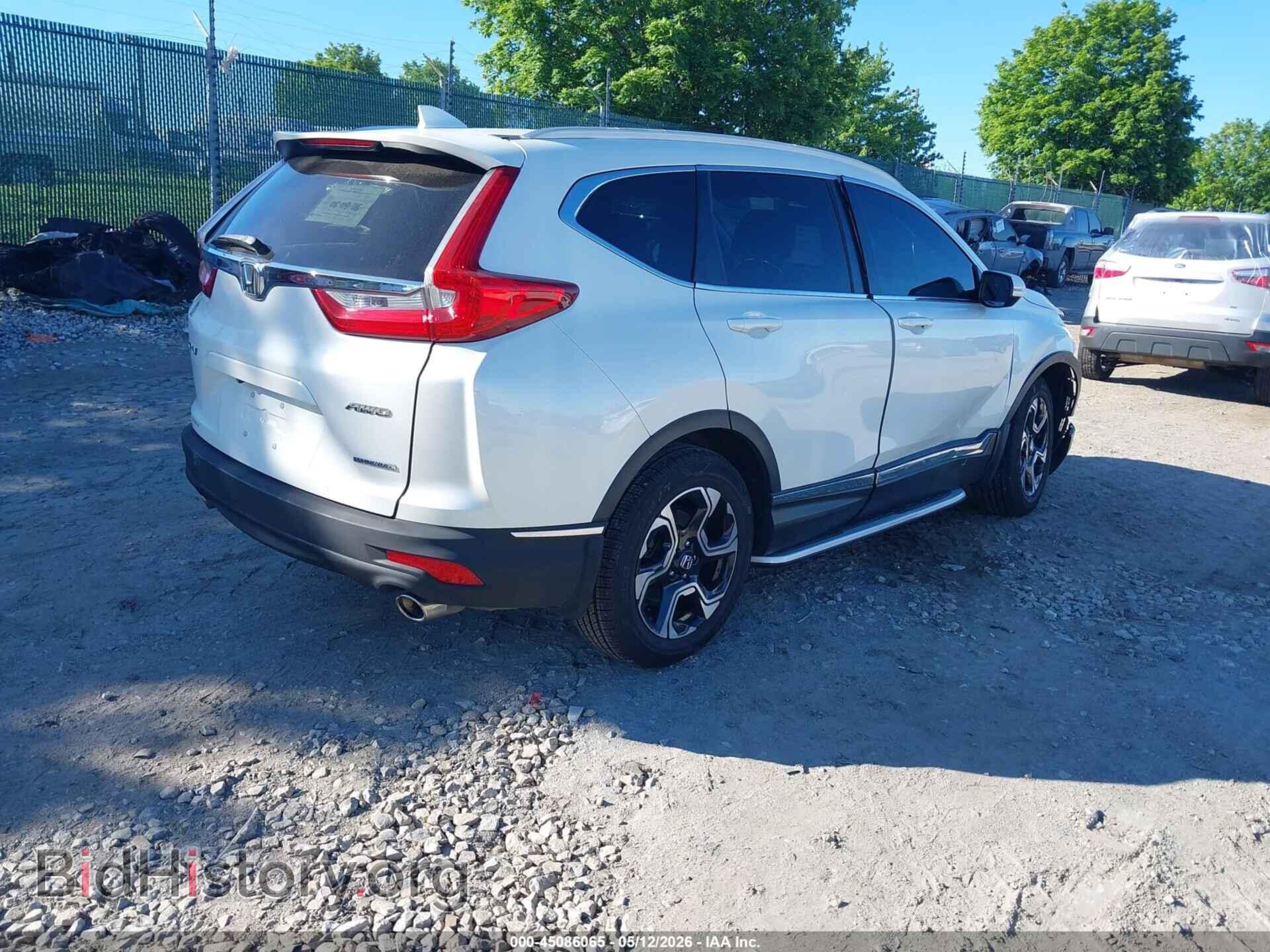 2018 HONDA CR-V - VIN: 2HKRW2H96JH614270 - Фото 4