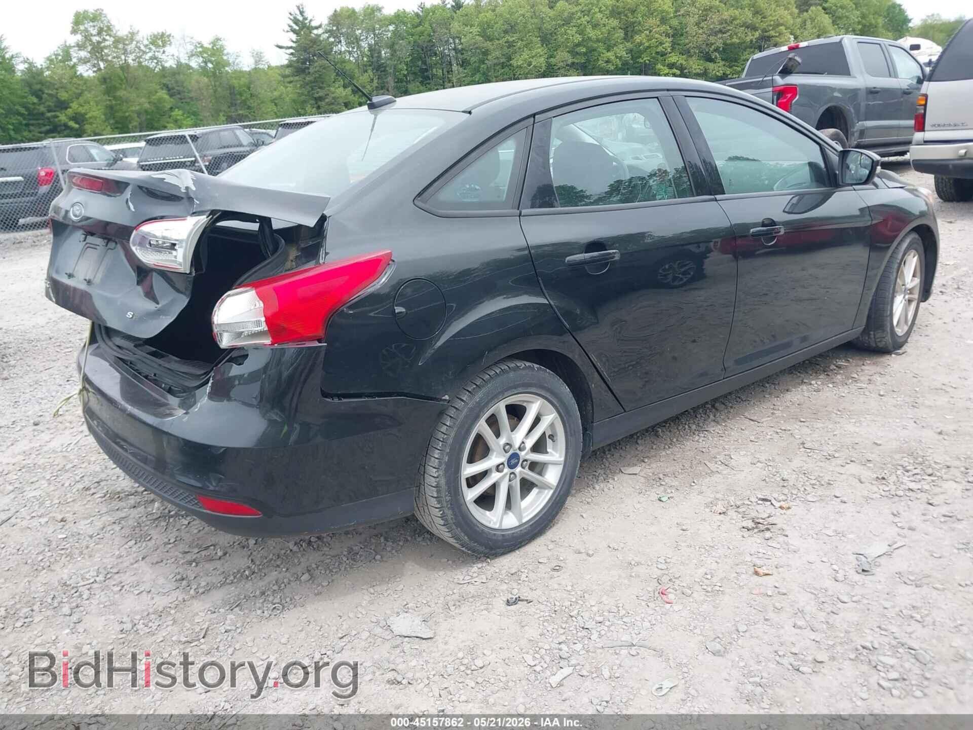 2015 FORD FOCUS - VIN: 1FADP3F27FL296509 - Photo 4