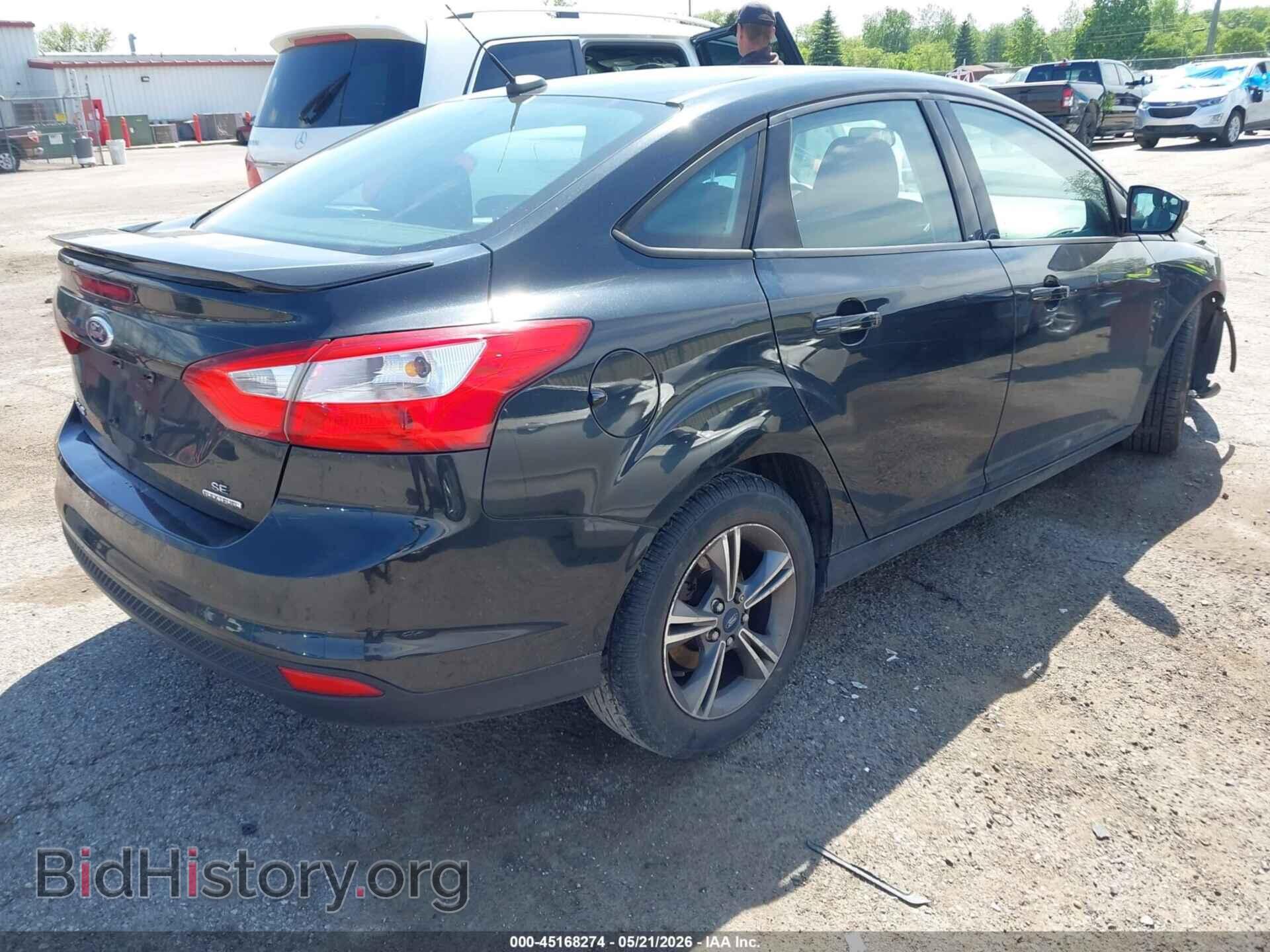 2014 FORD FOCUS - VIN: 1FADP3F27EL320810 - Photo 4