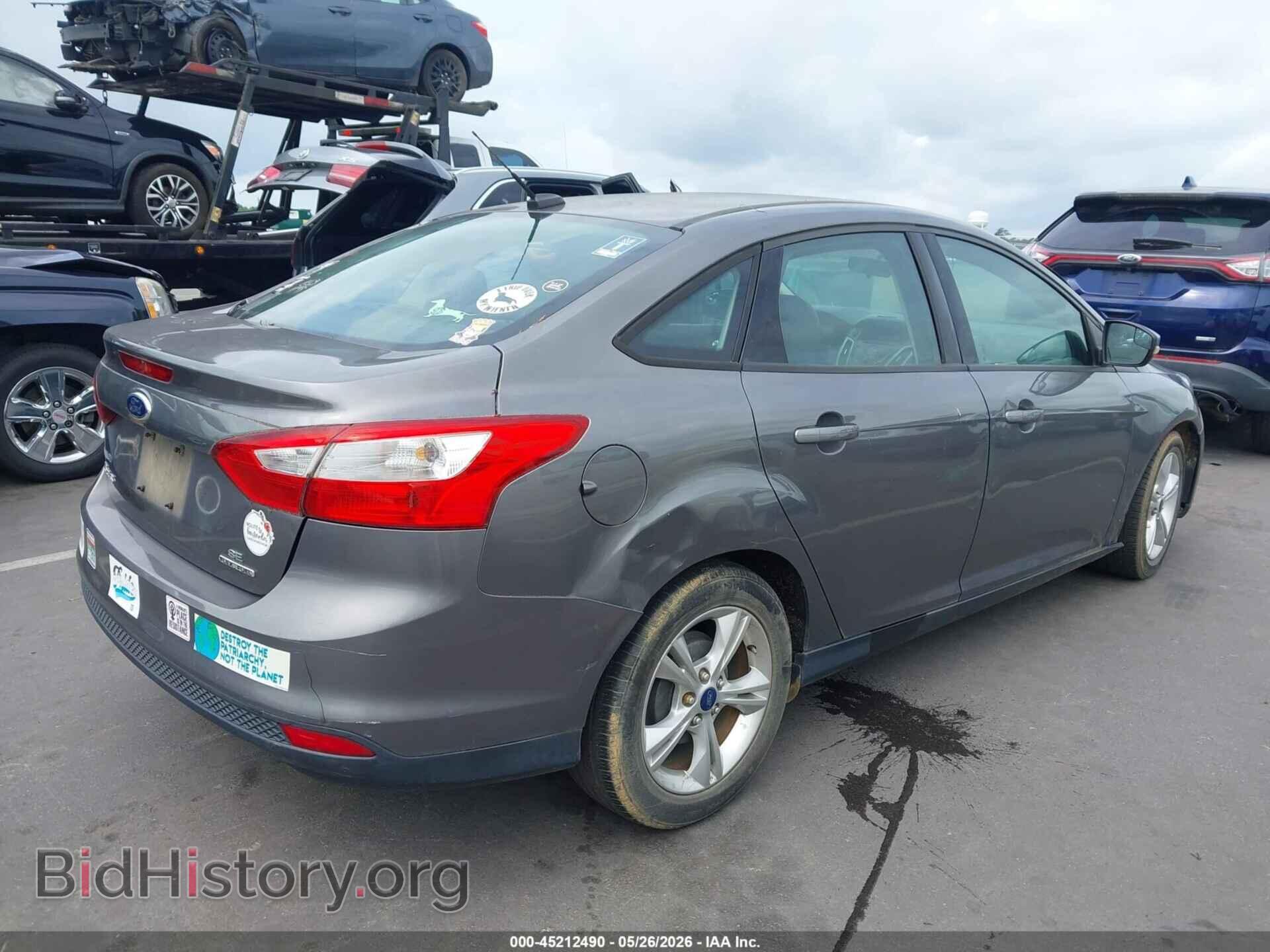 2014 FORD FOCUS - VIN: 1FADP3F20EL114860 - Photo 4