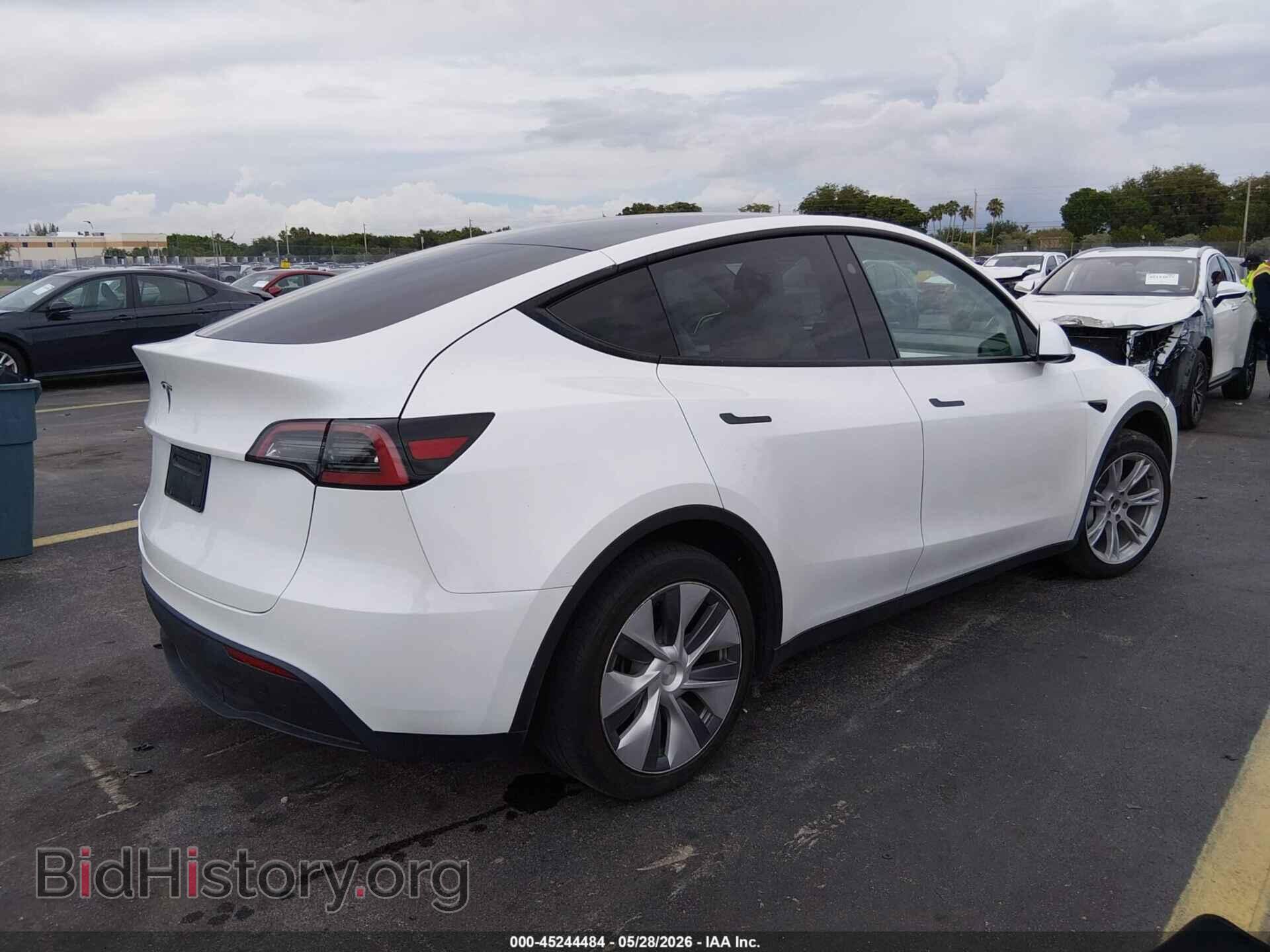 2023 TESLA MODEL Y - VIN: 7SAYGDEDXPF922789 - Фото 4
