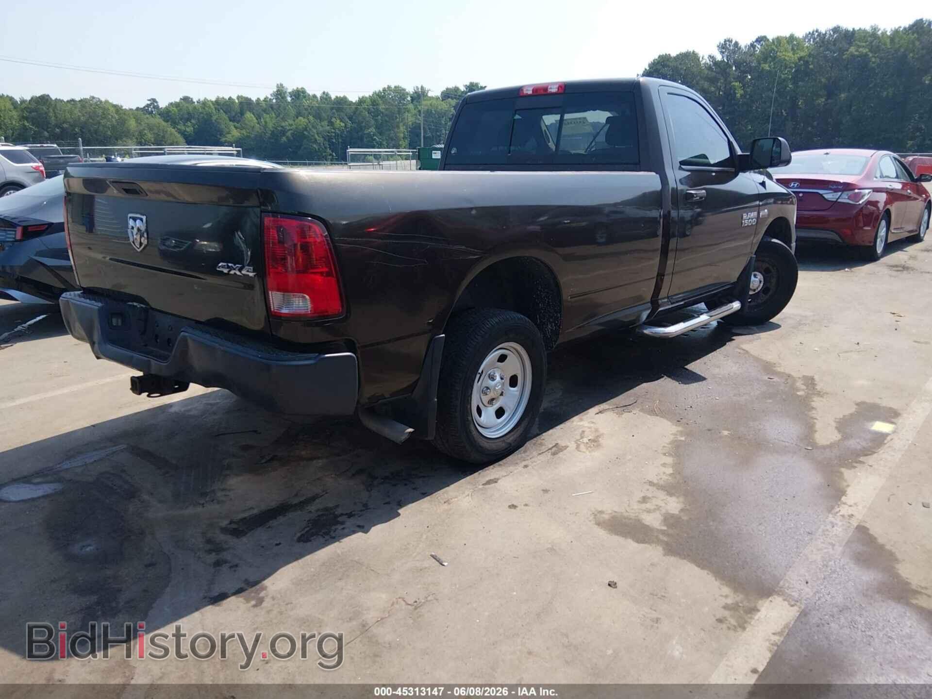 2014 RAM 1500 - VIN: 3C6JR7DTXEG101824 - Photo 4