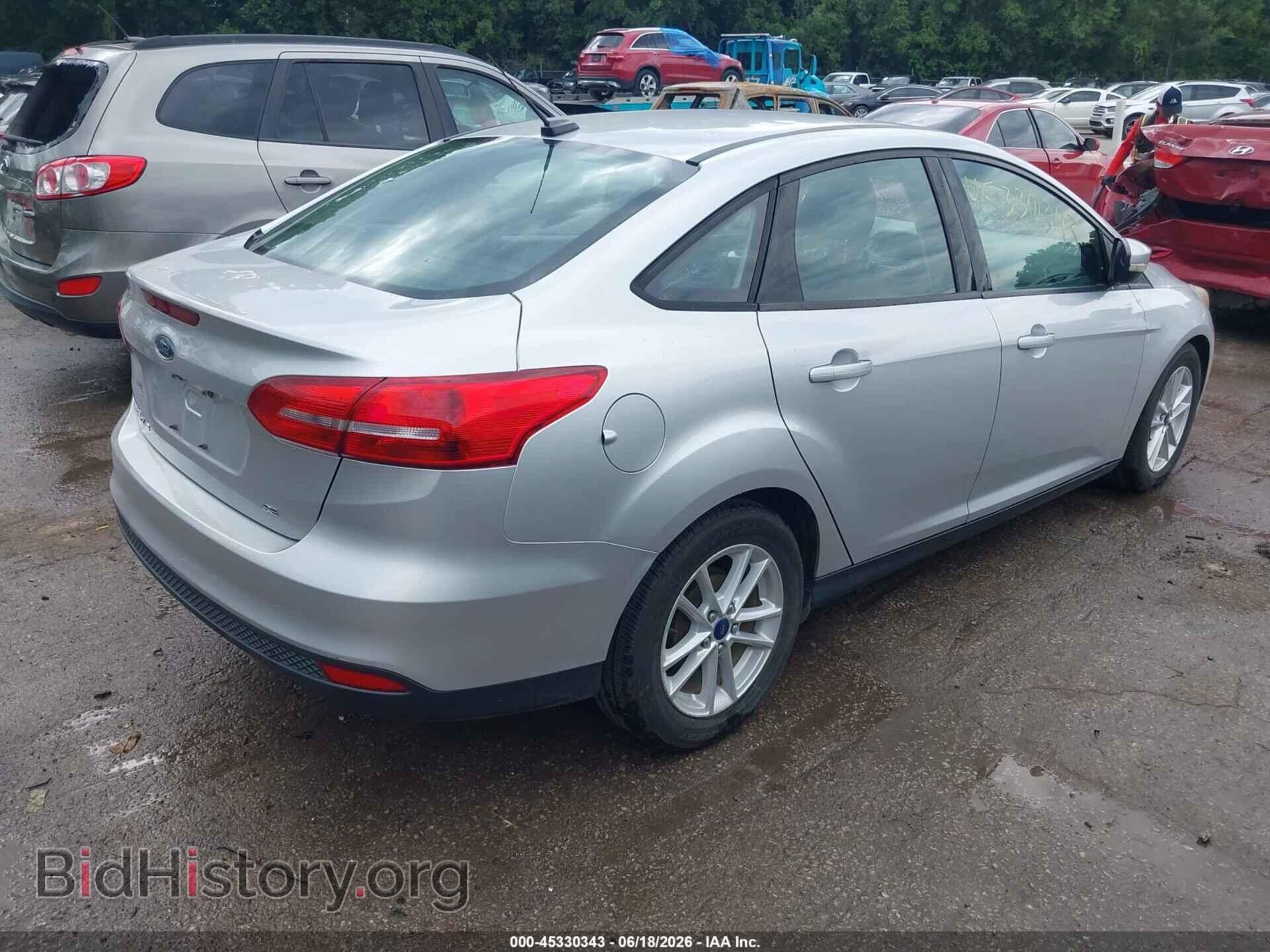 2017 FORD FOCUS - VIN: 1FADP3F21HL328891 - Photo 4