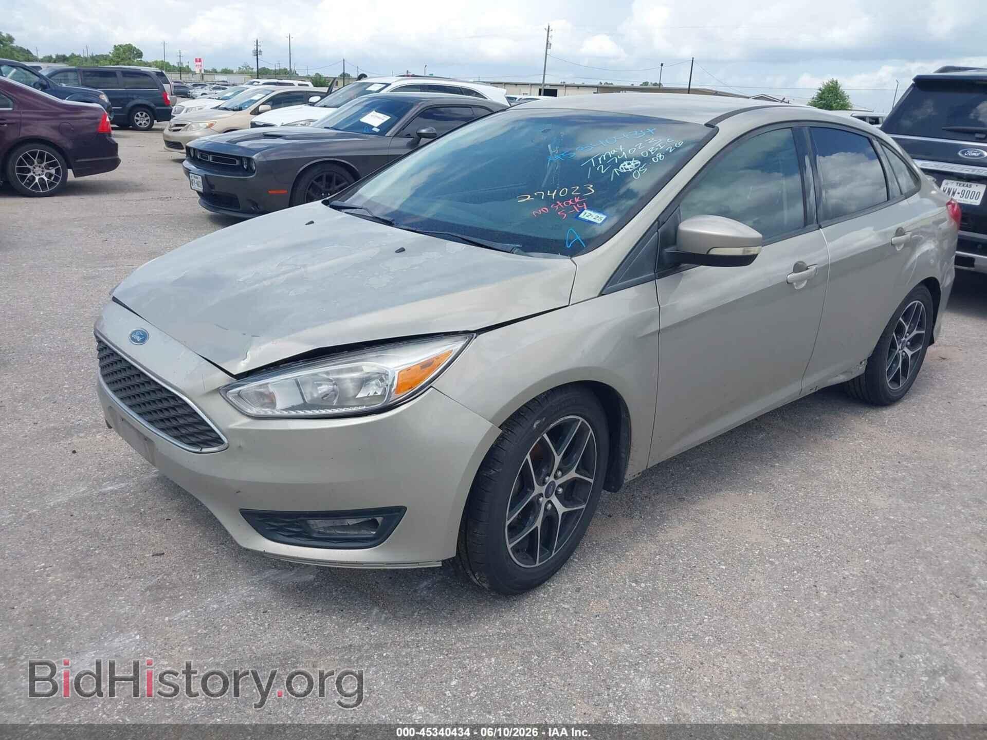 2016 FORD FOCUS - VIN: 1FADP3F21GL274023 - Фото 2