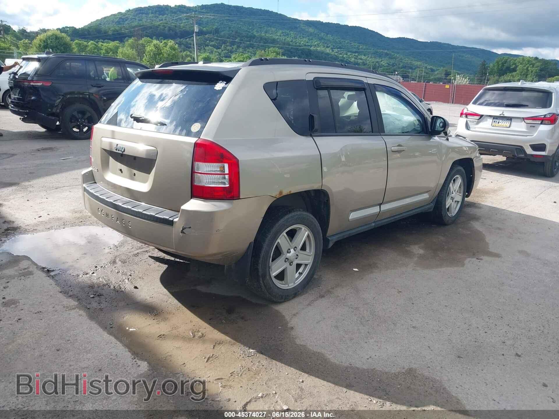 2010 JEEP COMPASS - VIN: 1J4NF1FB1AD623358 - Фото 4