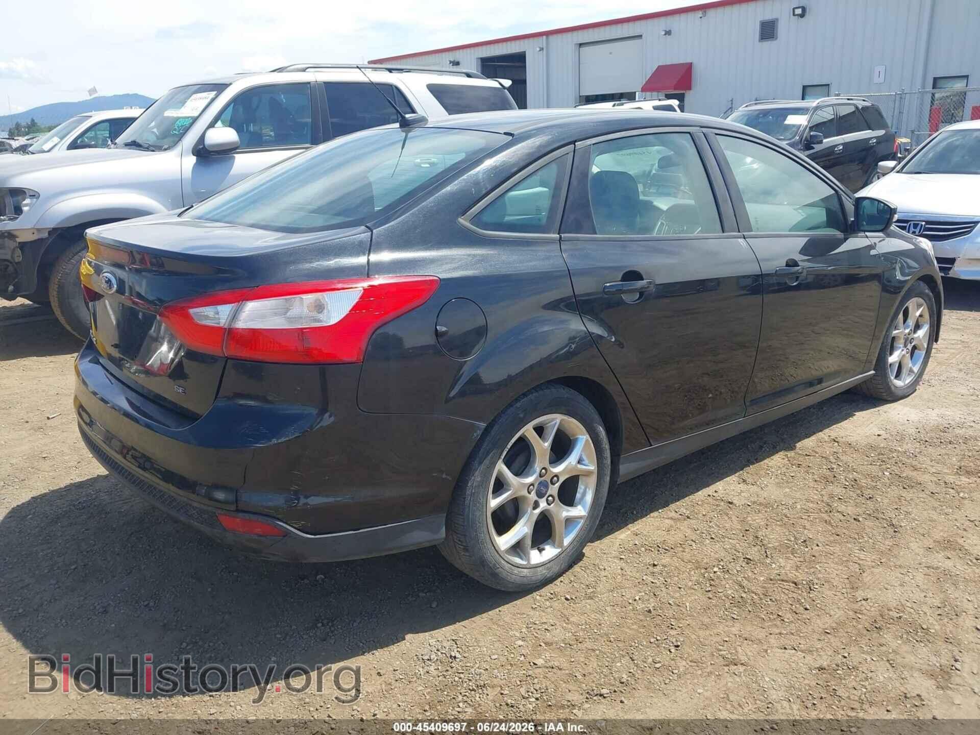 2014 FORD FOCUS - VIN: 1FADP3F29EL163121 - Photo 4