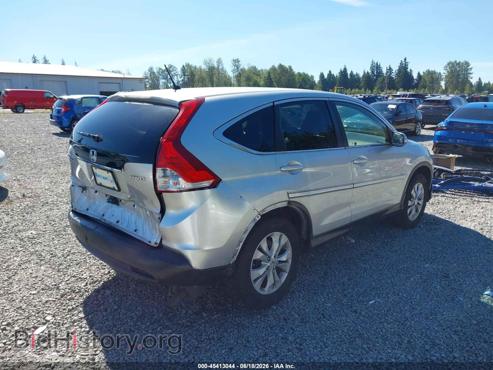 2012 HONDA CR-V - VIN: 2HKRM4H55CH613533 - Фото 4