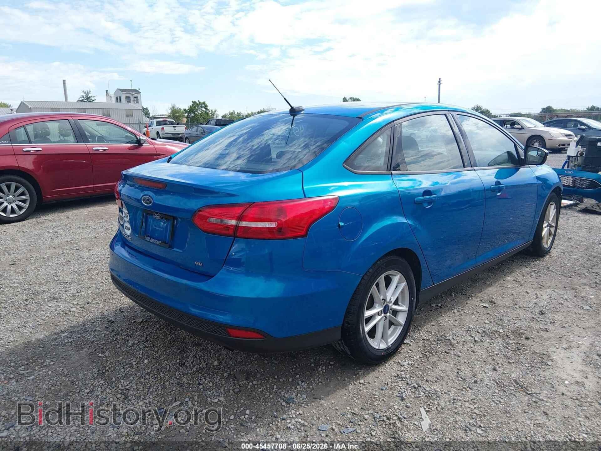 2016 FORD FOCUS - VIN: 1FADP3F21GL381153 - Photo 4