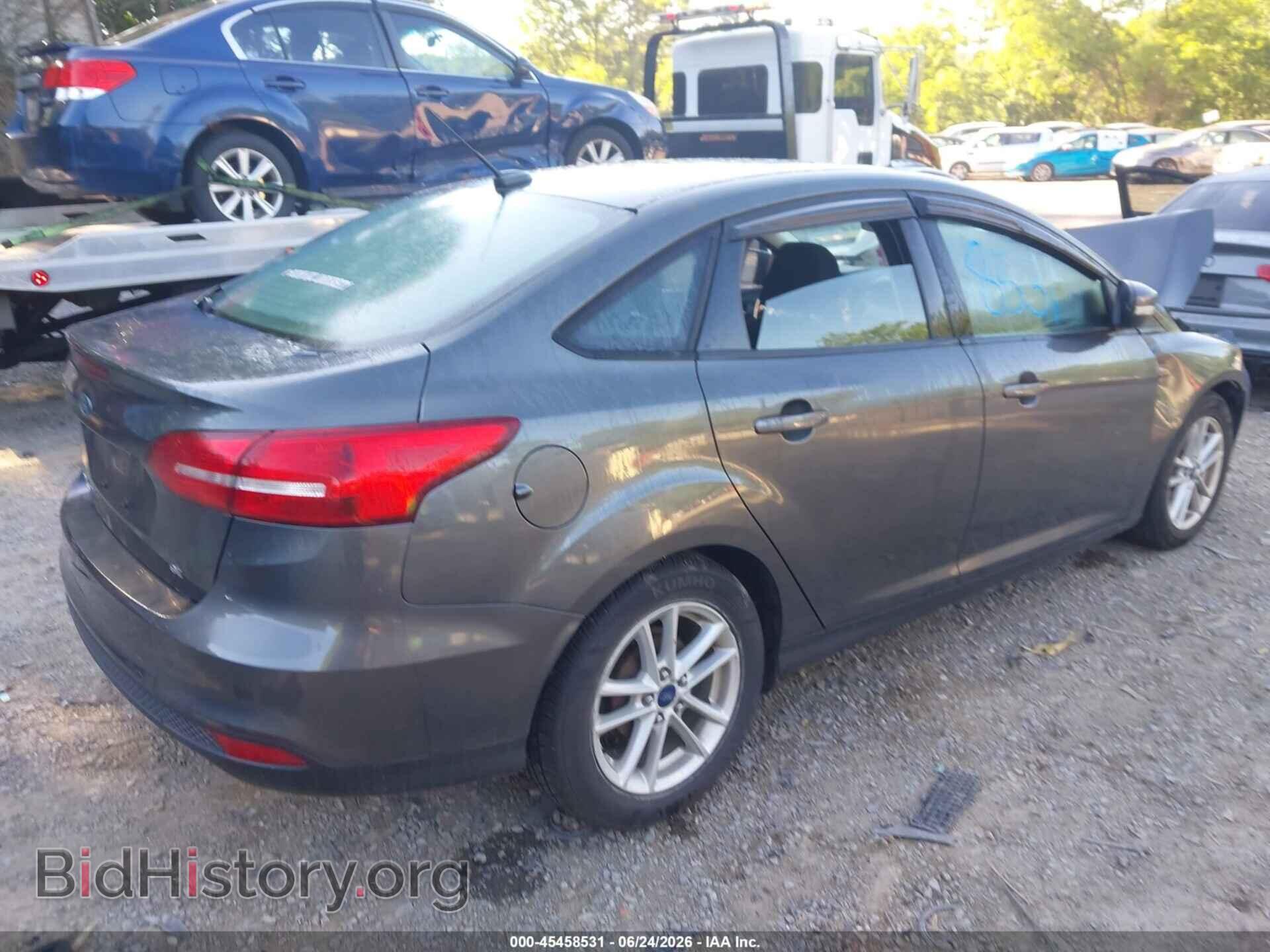 2017 FORD FOCUS - VIN: 1FADP3F23HL294985 - Photo 4