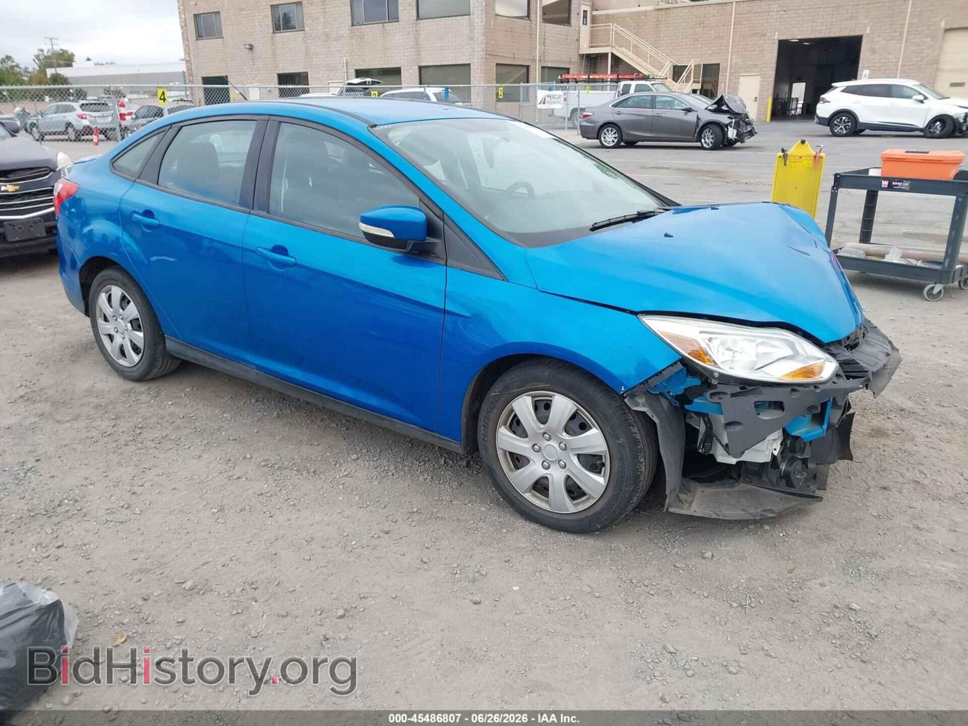 Фотография 1FADP3F25EL355698 - FORD FOCUS 2014