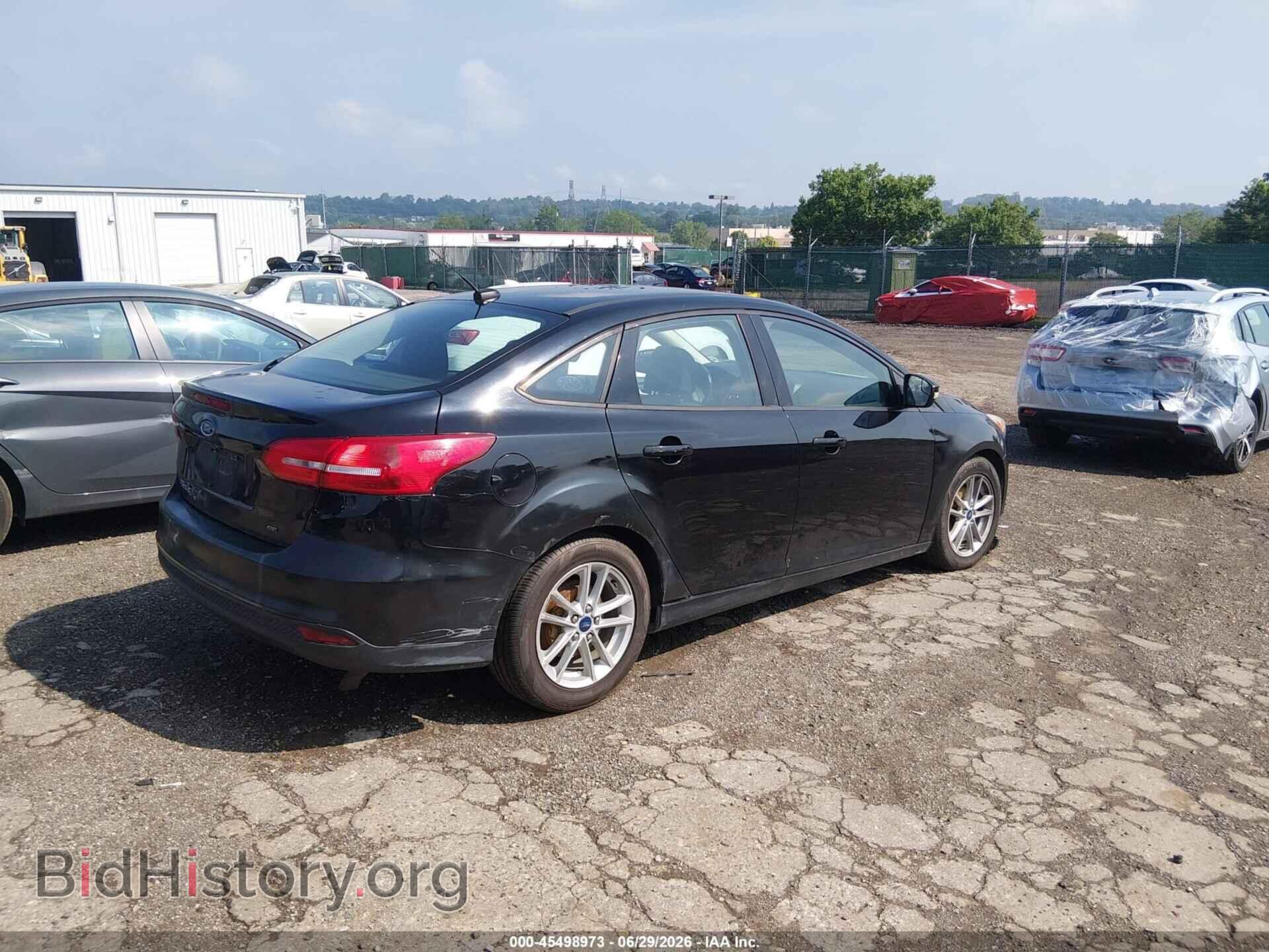 2017 FORD FOCUS - VIN: 1FADP3F25HL335844 - Photo 4