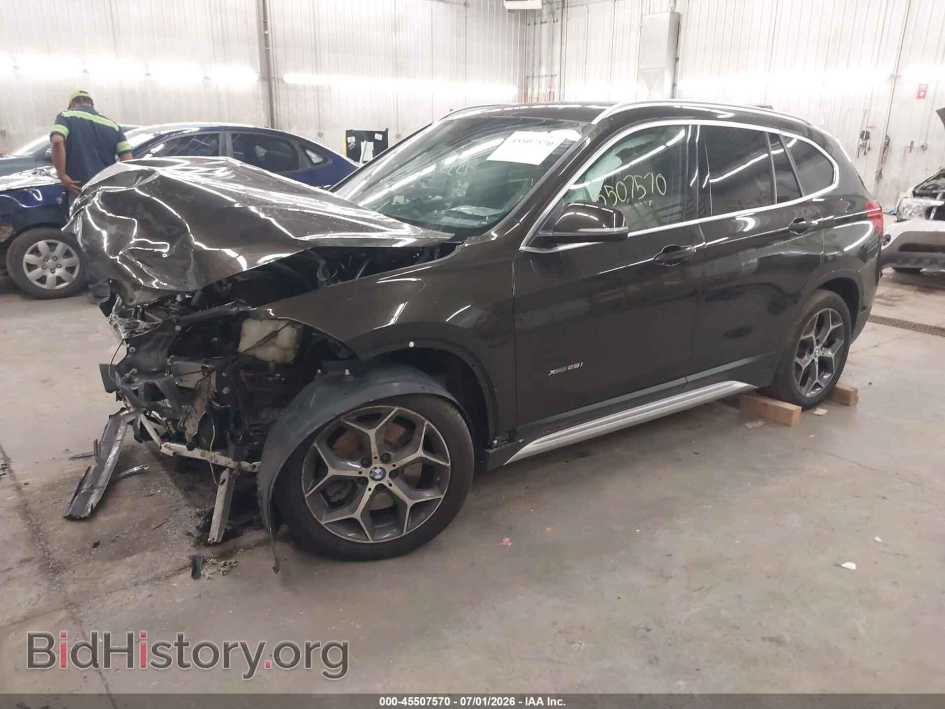 2016 BMW X1 - VIN: WBXHT3C32G5E48003 - Фото 2