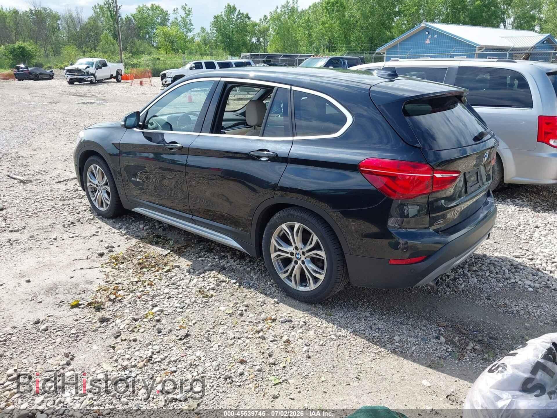 2018 BMW X1 - VIN: WBXHT3C39J5F88198 - Фото 3