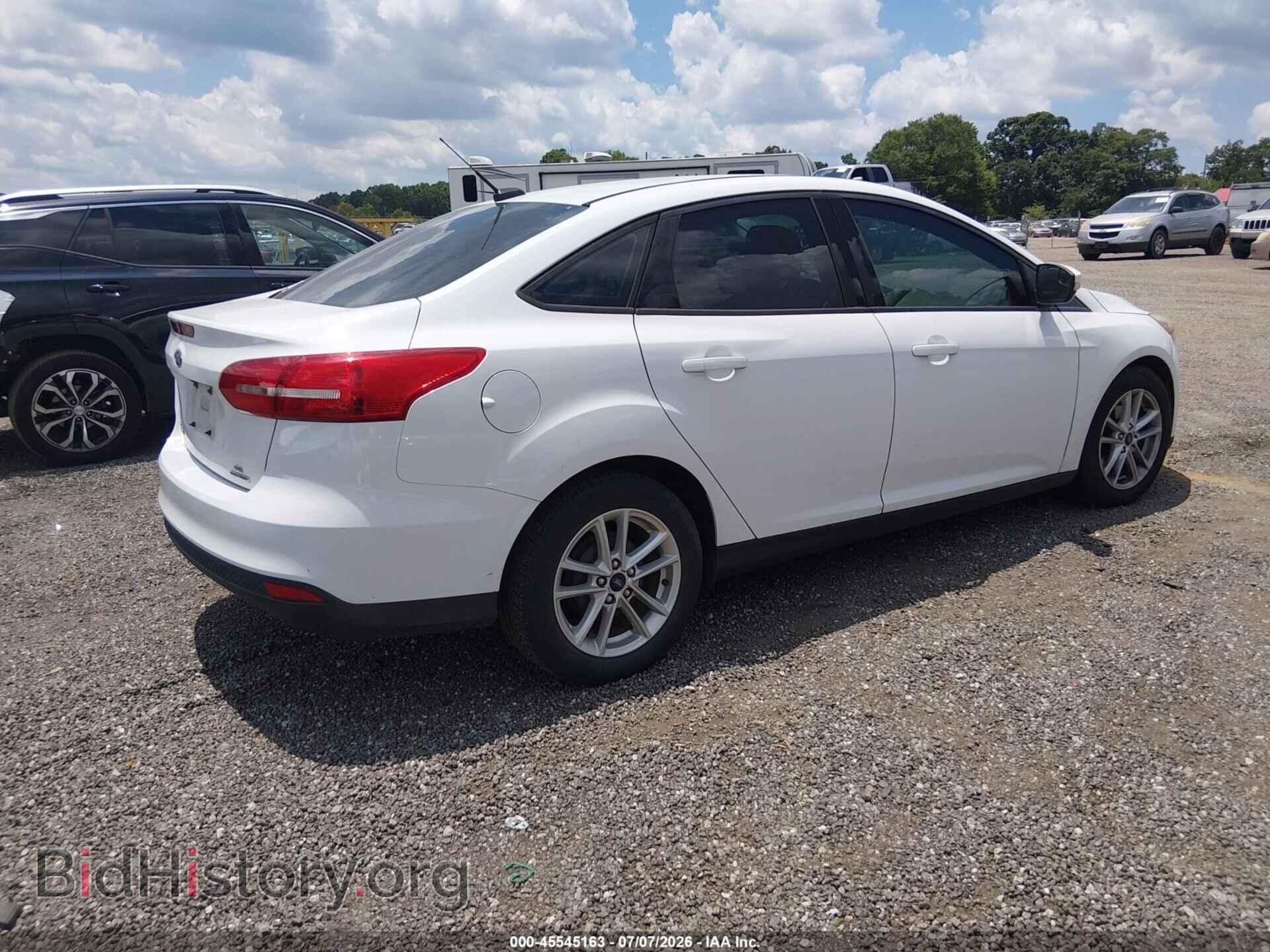 2015 FORD FOCUS - VIN: 1FADP3F2XFL292244 - Photo 4