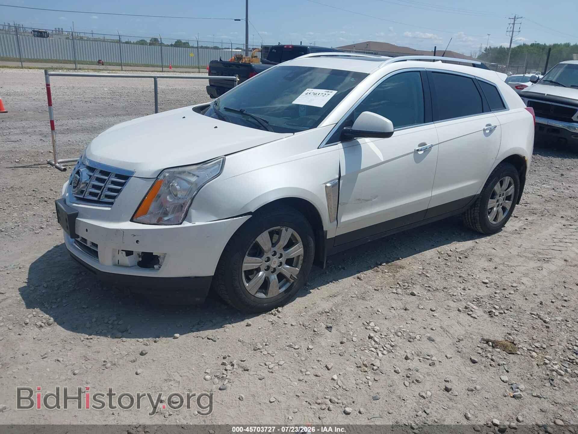 2014 CADILLAC SRX - VIN: 3GYFNEE31ES587007 - Фото 2