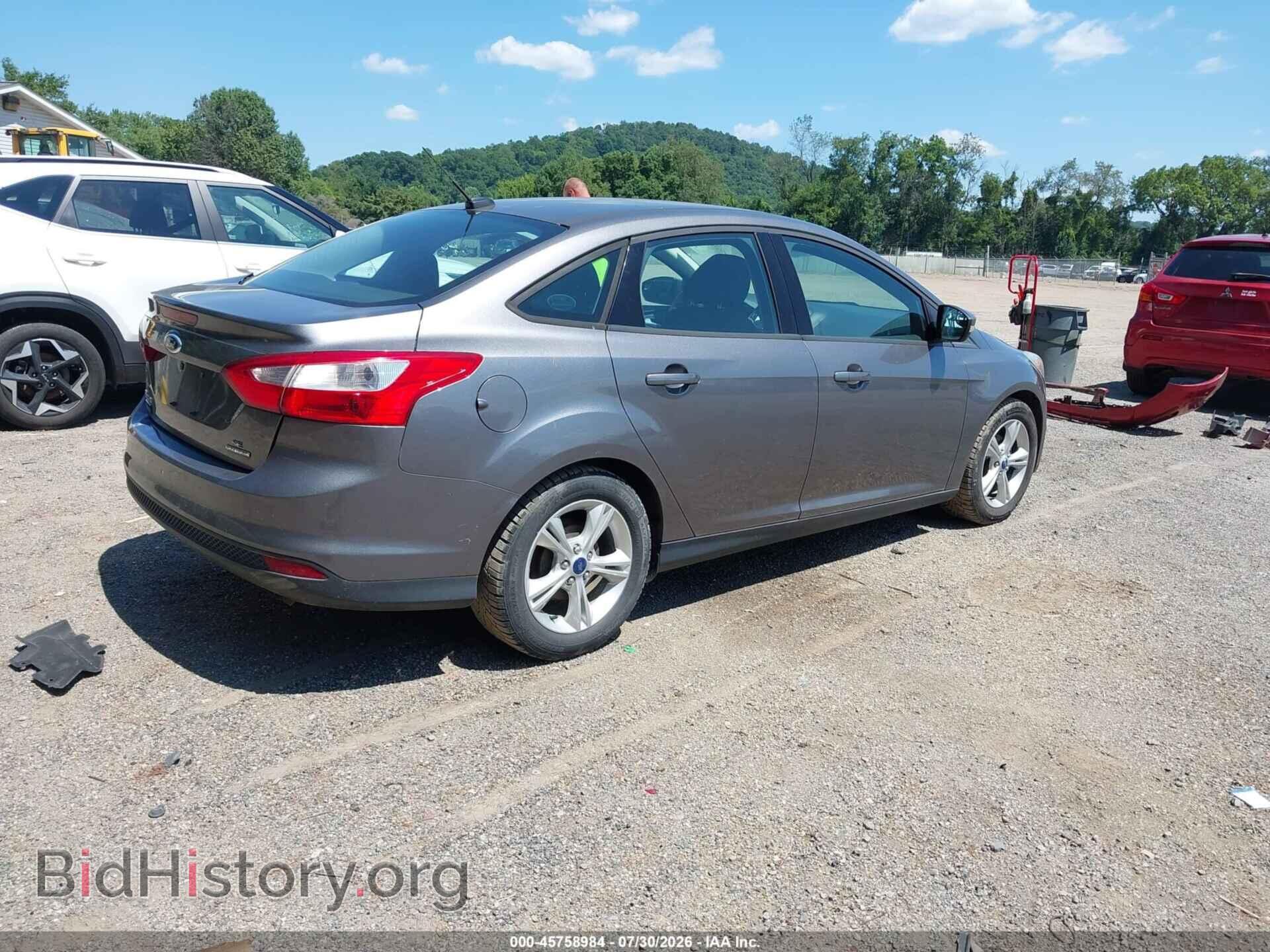 2014 FORD FOCUS - VIN: 1FADP3F2XEL450483 - Photo 4