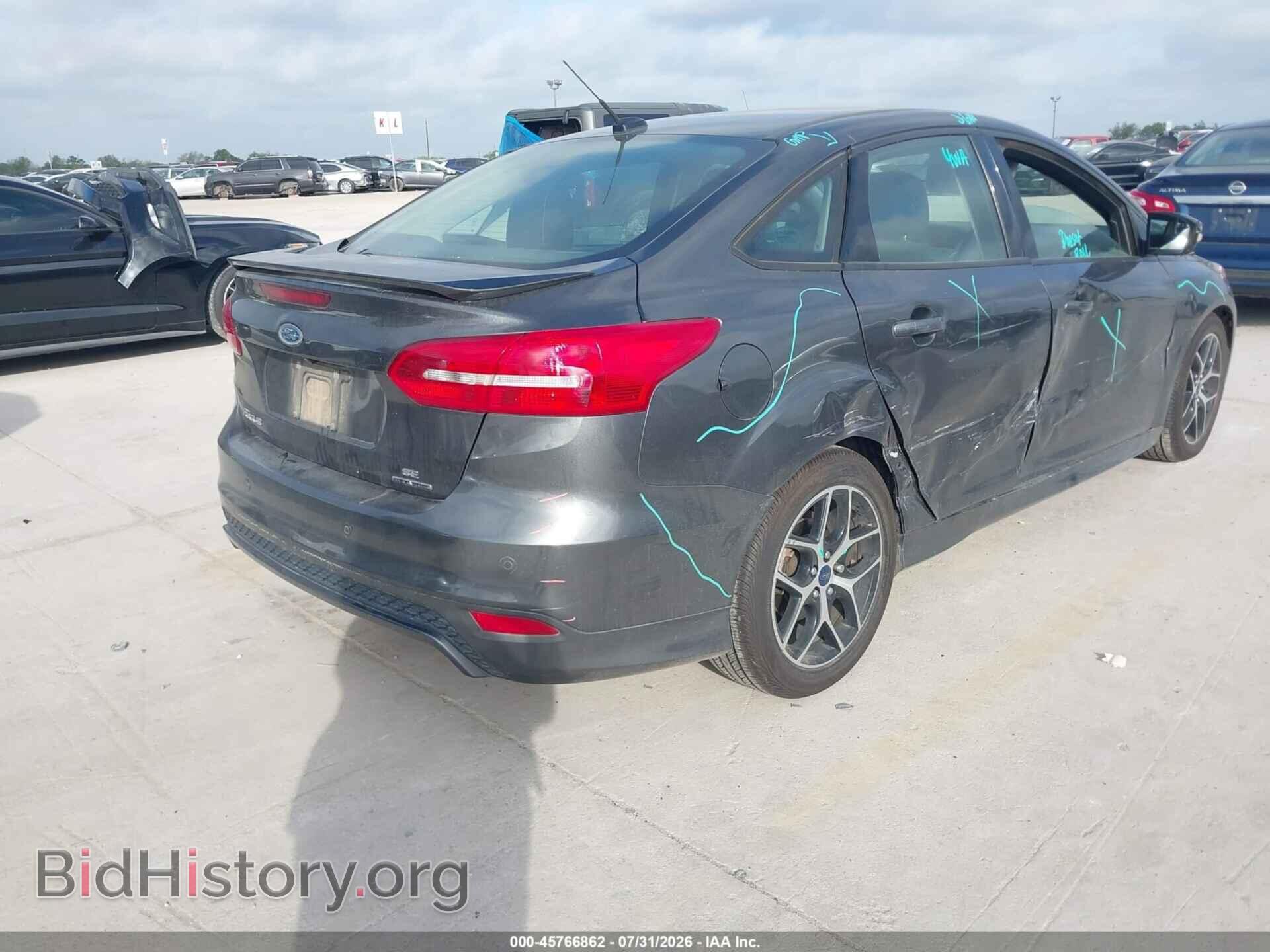 2016 FORD FOCUS - VIN: 1FADP3F27GL289125 - Photo 4