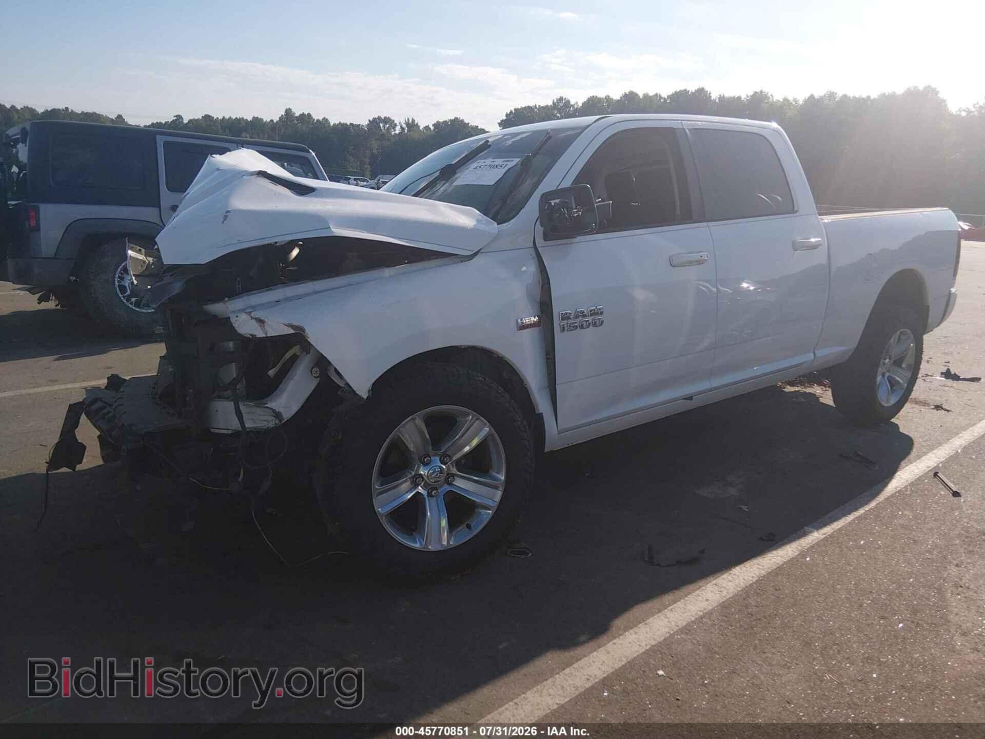2014 RAM 1500 - VIN: 1C6RR6UT6ES448590 - Фото 2