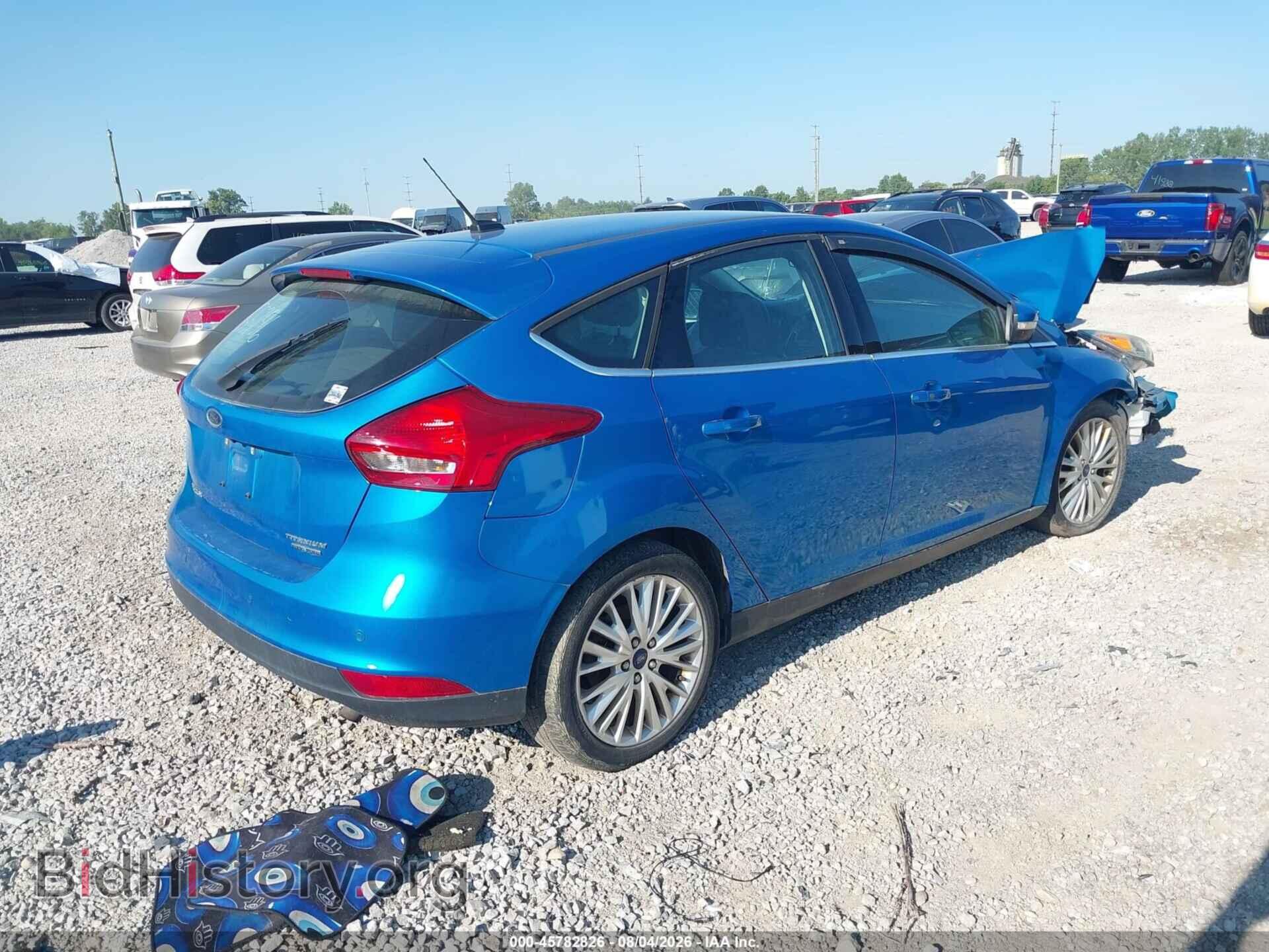 2015 FORD FOCUS - VIN: 1FADP3N21FL355796 - Photo 4