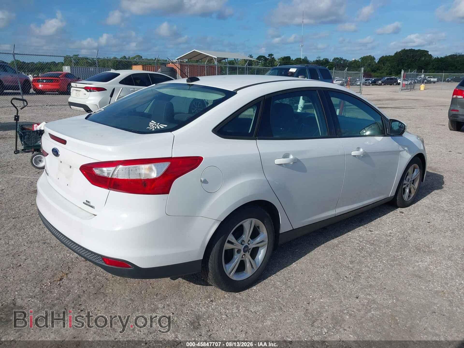 2014 FORD FOCUS - VIN: 1FADP3F24EL251994 - Photo 4