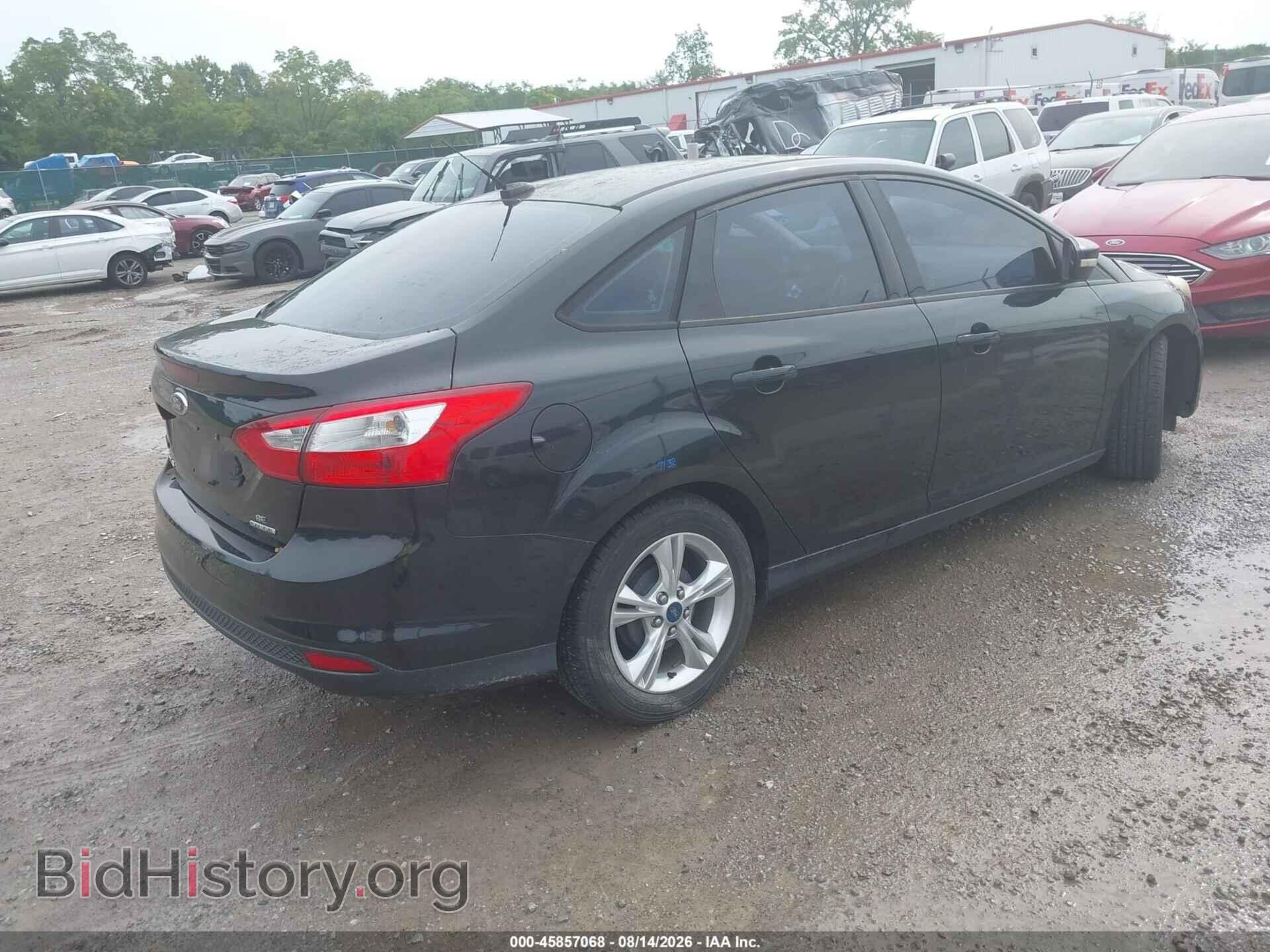 2014 FORD FOCUS - VIN: 1FADP3F28EL160677 - Photo 4