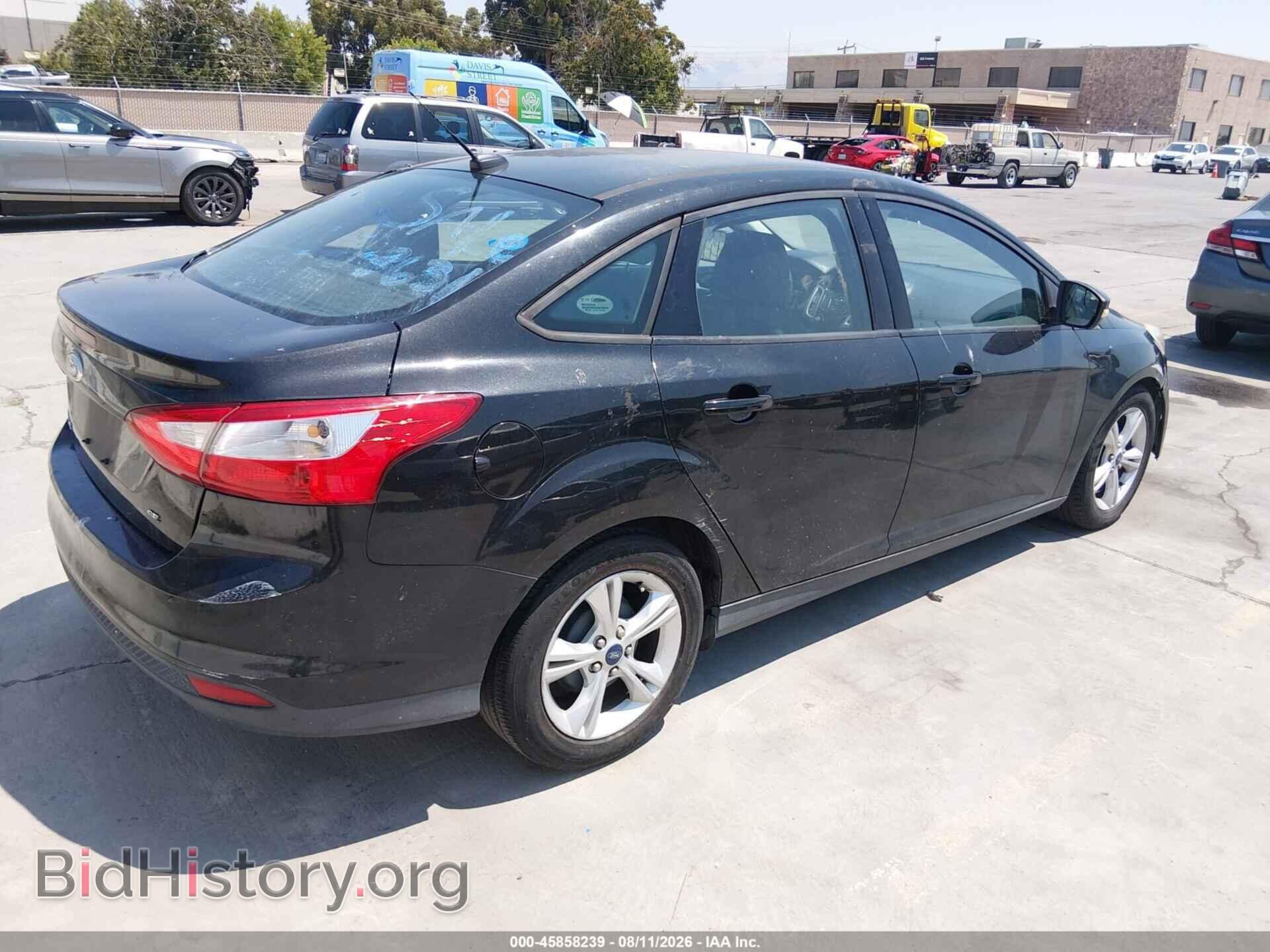 2014 FORD FOCUS - VIN: 1FADP3F21EL399701 - Photo 4