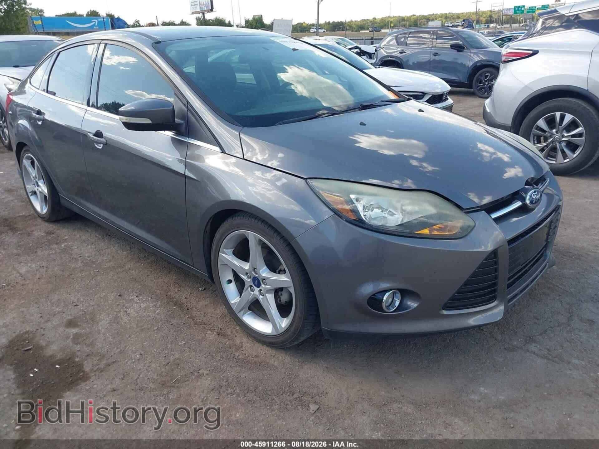 Фотография 1FADP3J26EL109346 - FORD FOCUS 2014