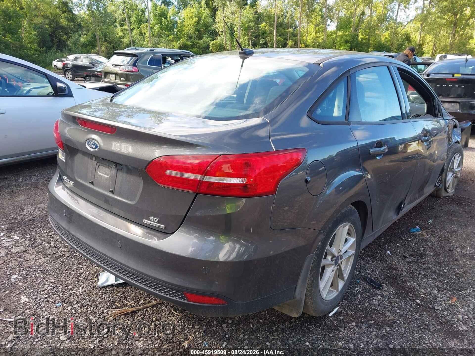 2015 FORD FOCUS - VIN: 1FADP3F29FL352062 - Photo 4