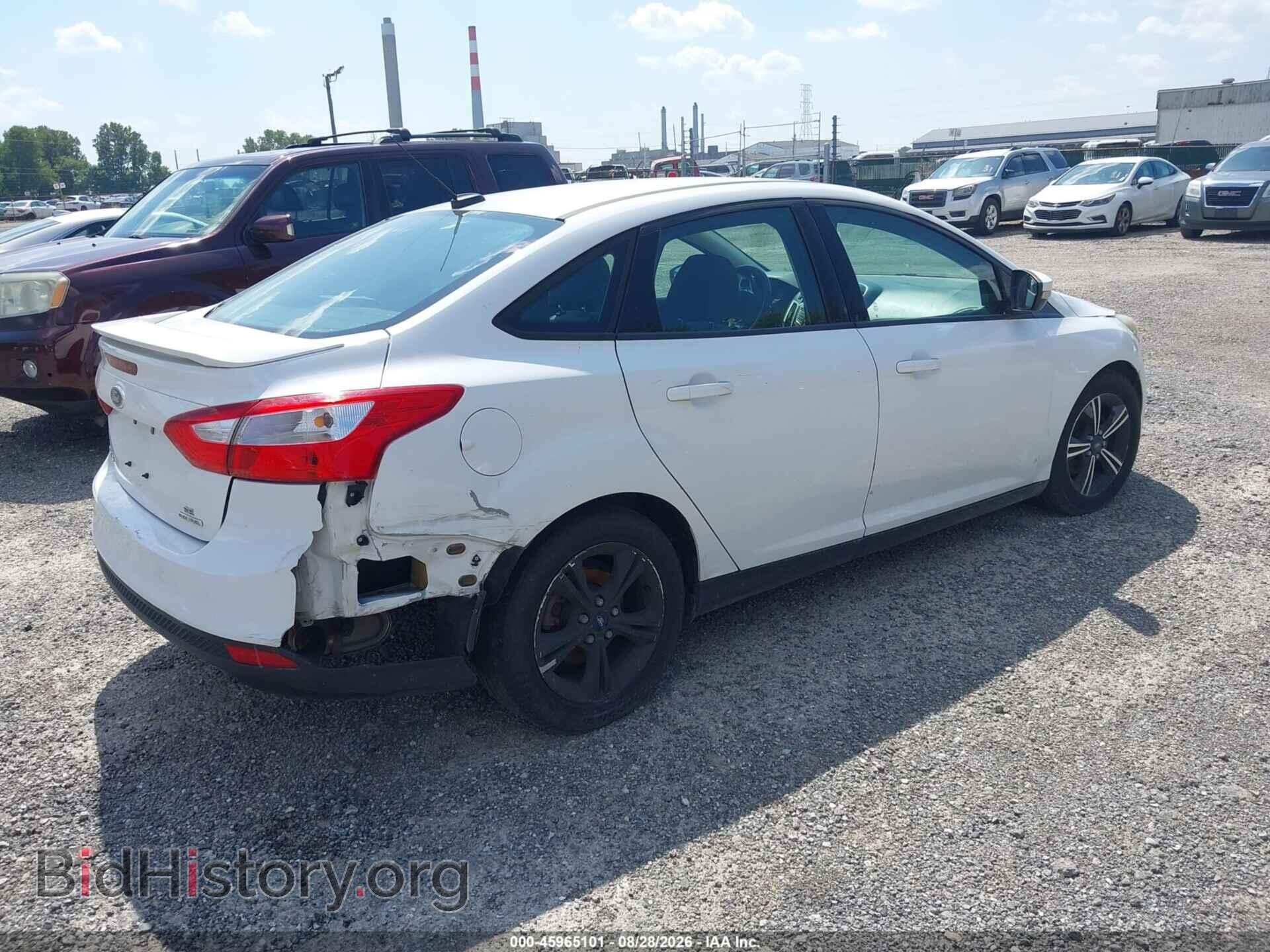 2014 FORD FOCUS - VIN: 1FADP3F20EL416536 - Photo 4
