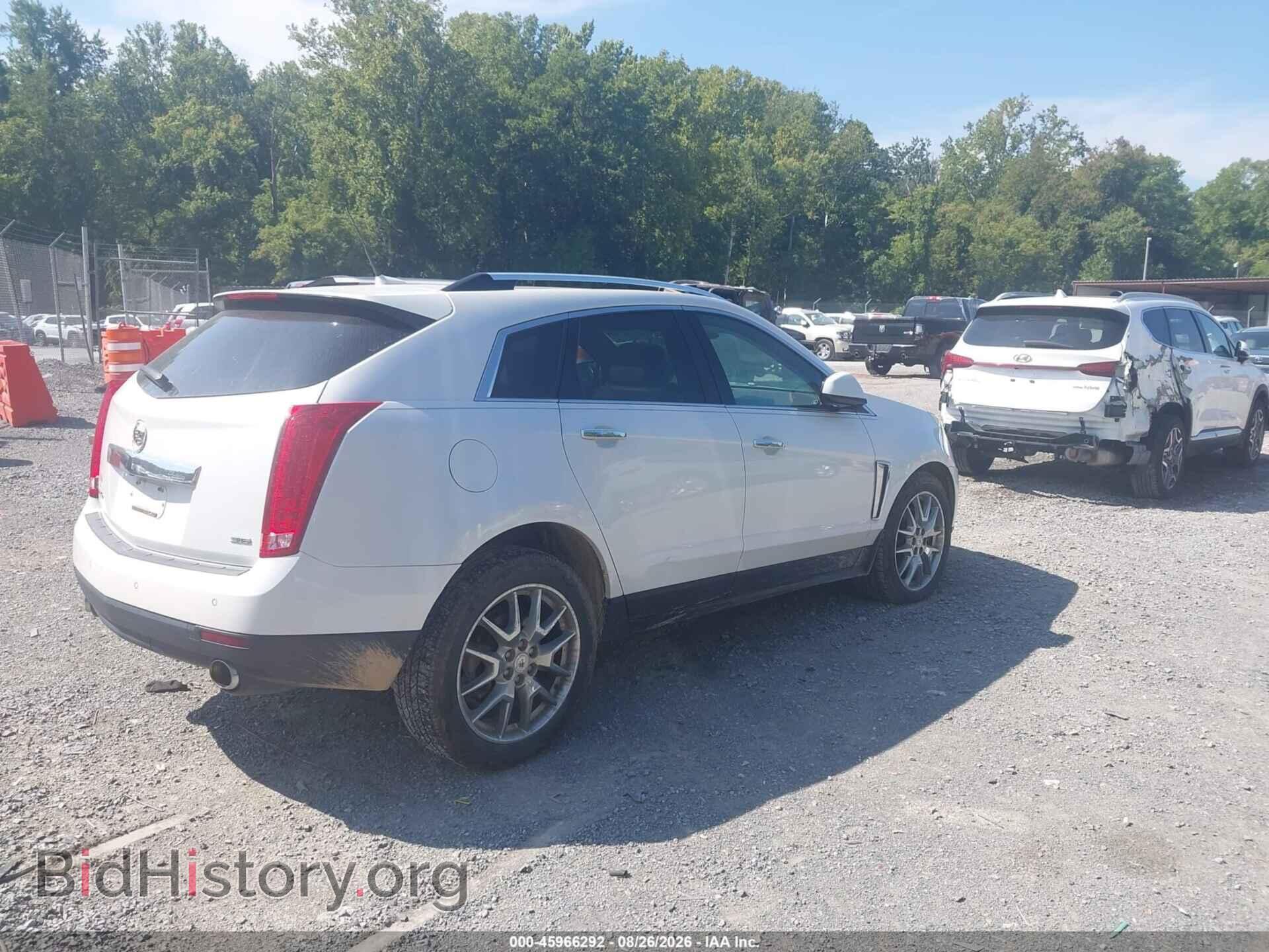 2014 CADILLAC SRX - VIN: 3GYFNGE3XES561808 - Фото 4
