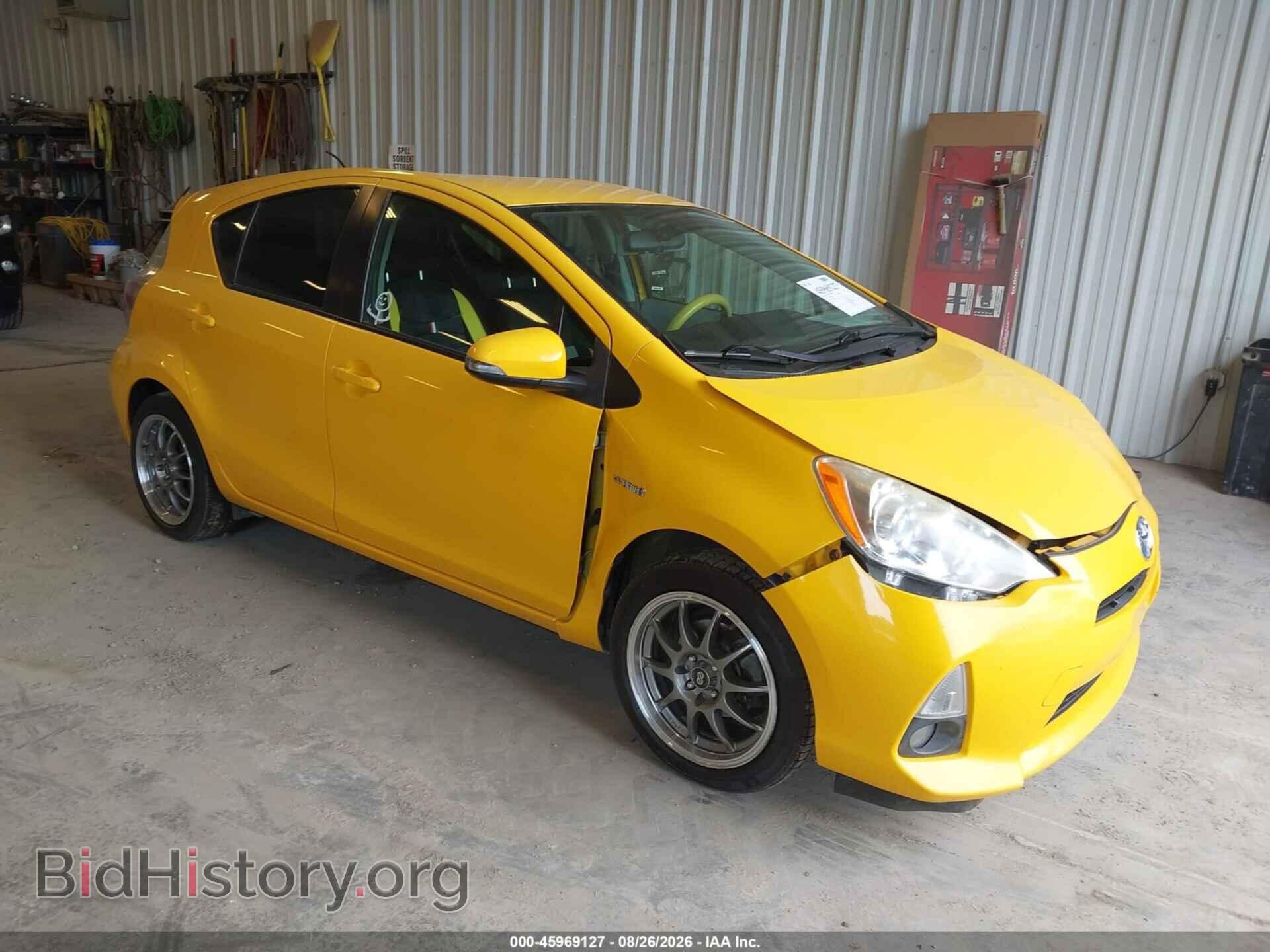 Фотография JTDKDTB3XE1079412 - TOYOTA PRIUS C 2014