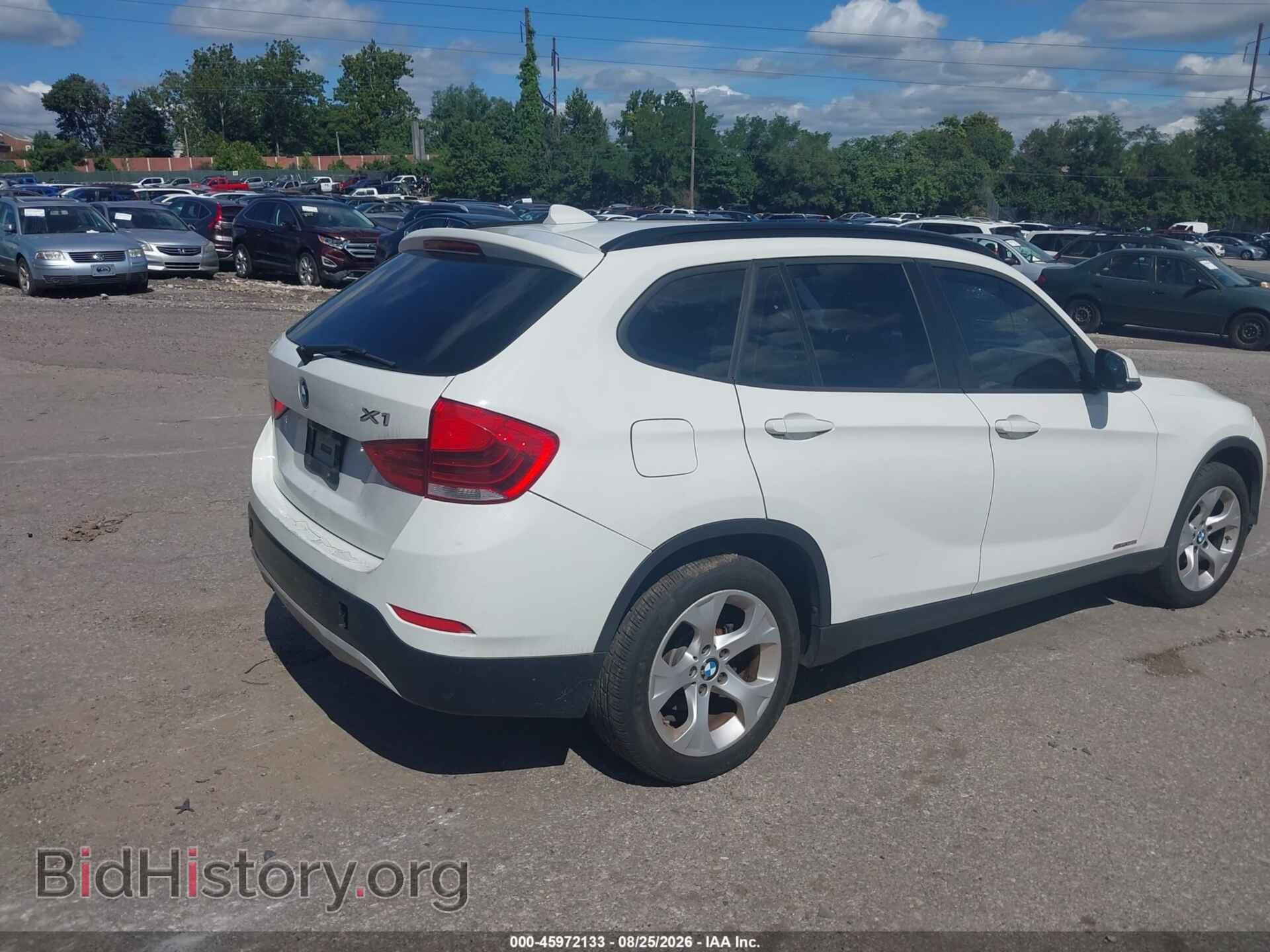 2014 BMW X1 - VIN: WBAVM1C51EVW55721 - Фото 4