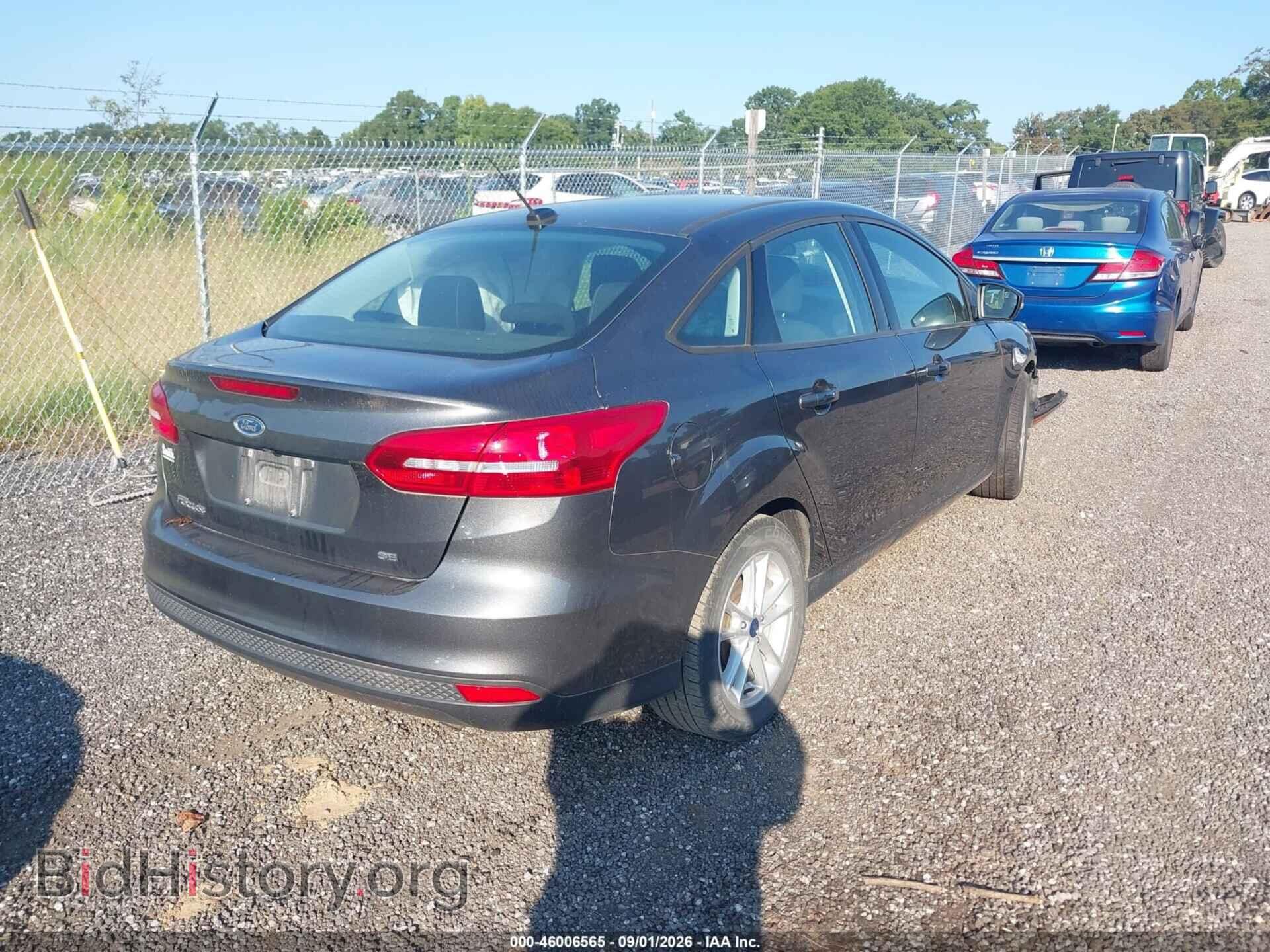 2017 FORD FOCUS - VIN: 1FADP3F21HL331841 - Photo 4