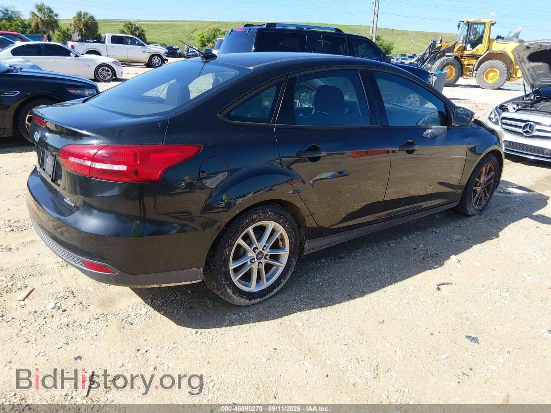 2015 FORD FOCUS - VIN: 1FADP3F2XFL201974 - Photo 4