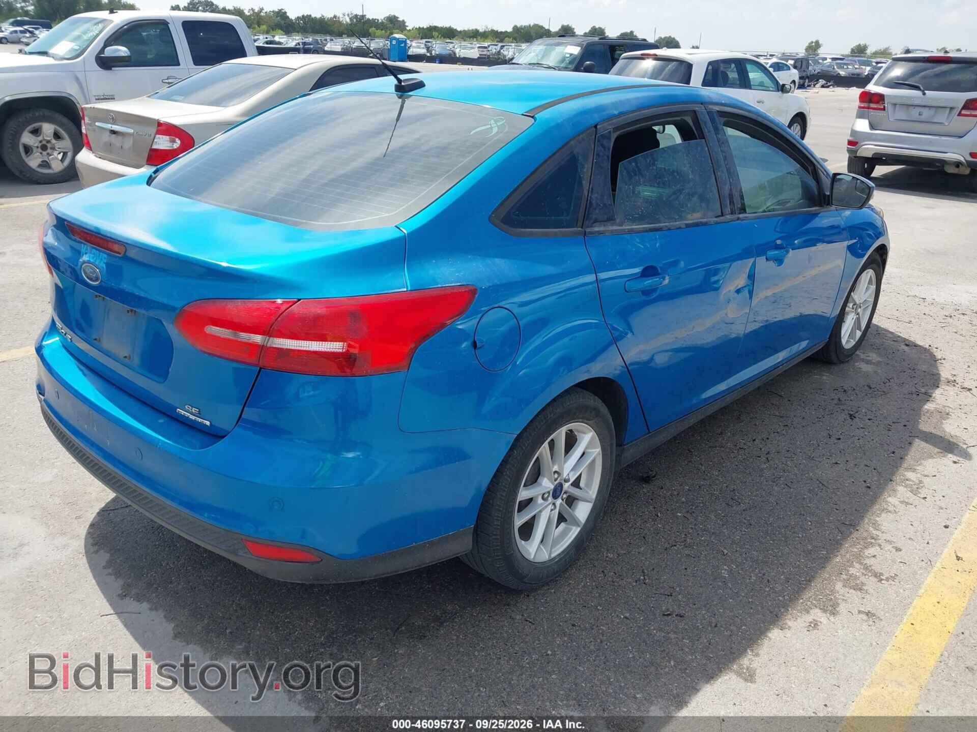2016 FORD FOCUS - VIN: 1FADP3F24GL404652 - Photo 4
