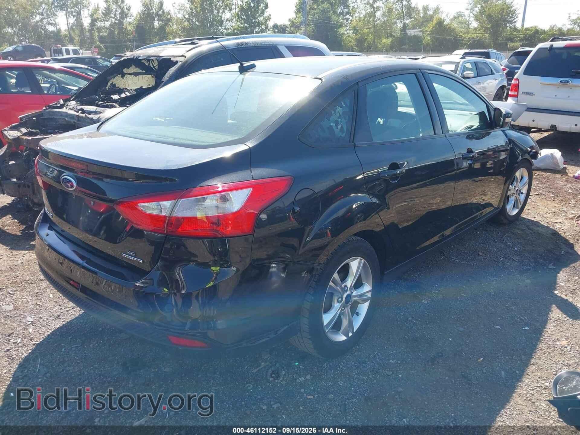 2014 FORD FOCUS - VIN: 1FADP3F22EL347526 - Photo 4