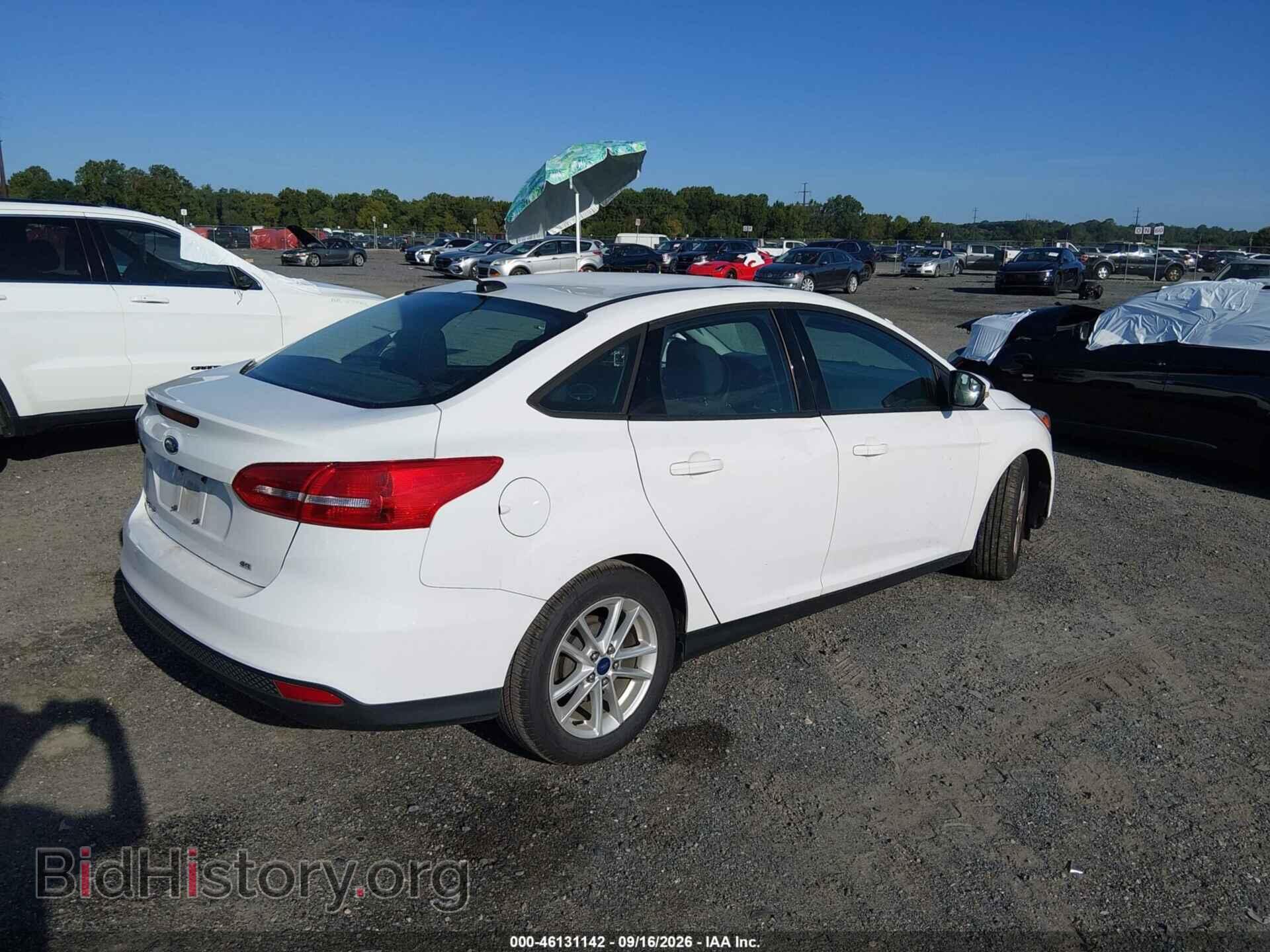 2015 FORD FOCUS - VIN: 1FADP3F20FL258667 - Photo 4