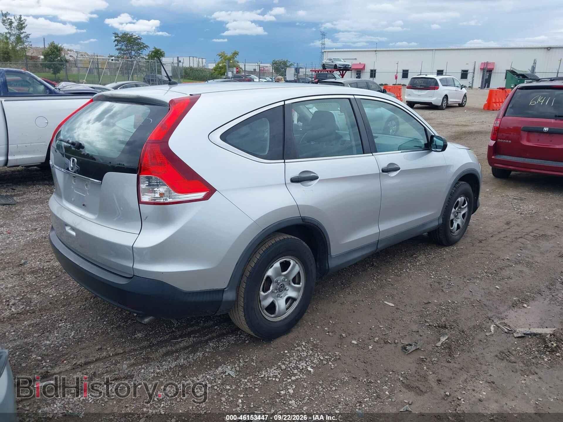 2014 HONDA CR-V - VIN: 2HKRM3H31EH521525 - Фото 4
