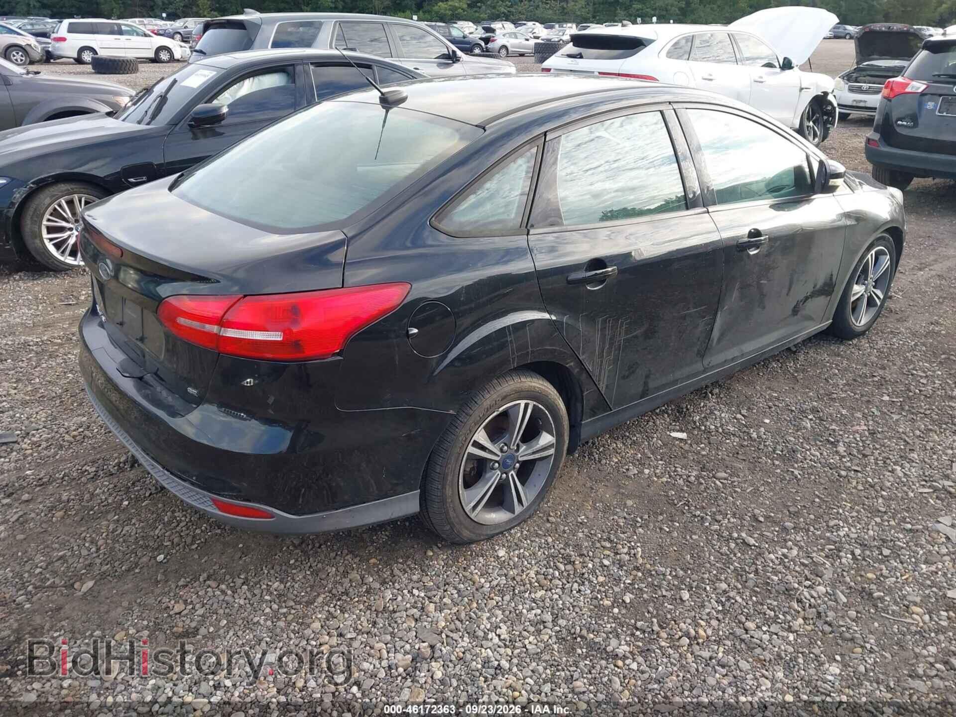 2016 FORD FOCUS - VIN: 1FADP3FE0GL218715 - Photo 4