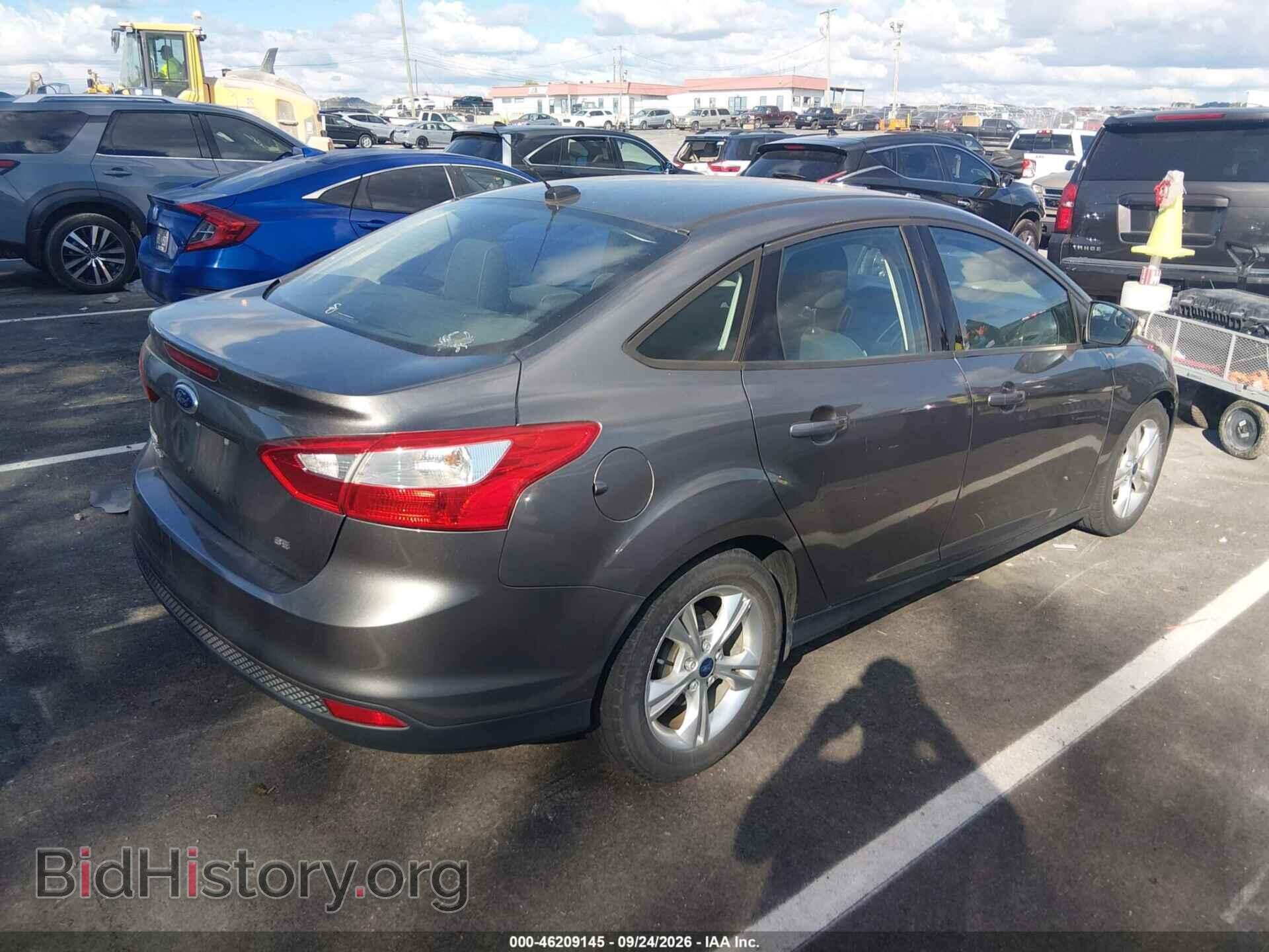 2014 FORD FOCUS - VIN: 1FADP3F2XEL280013 - Photo 4