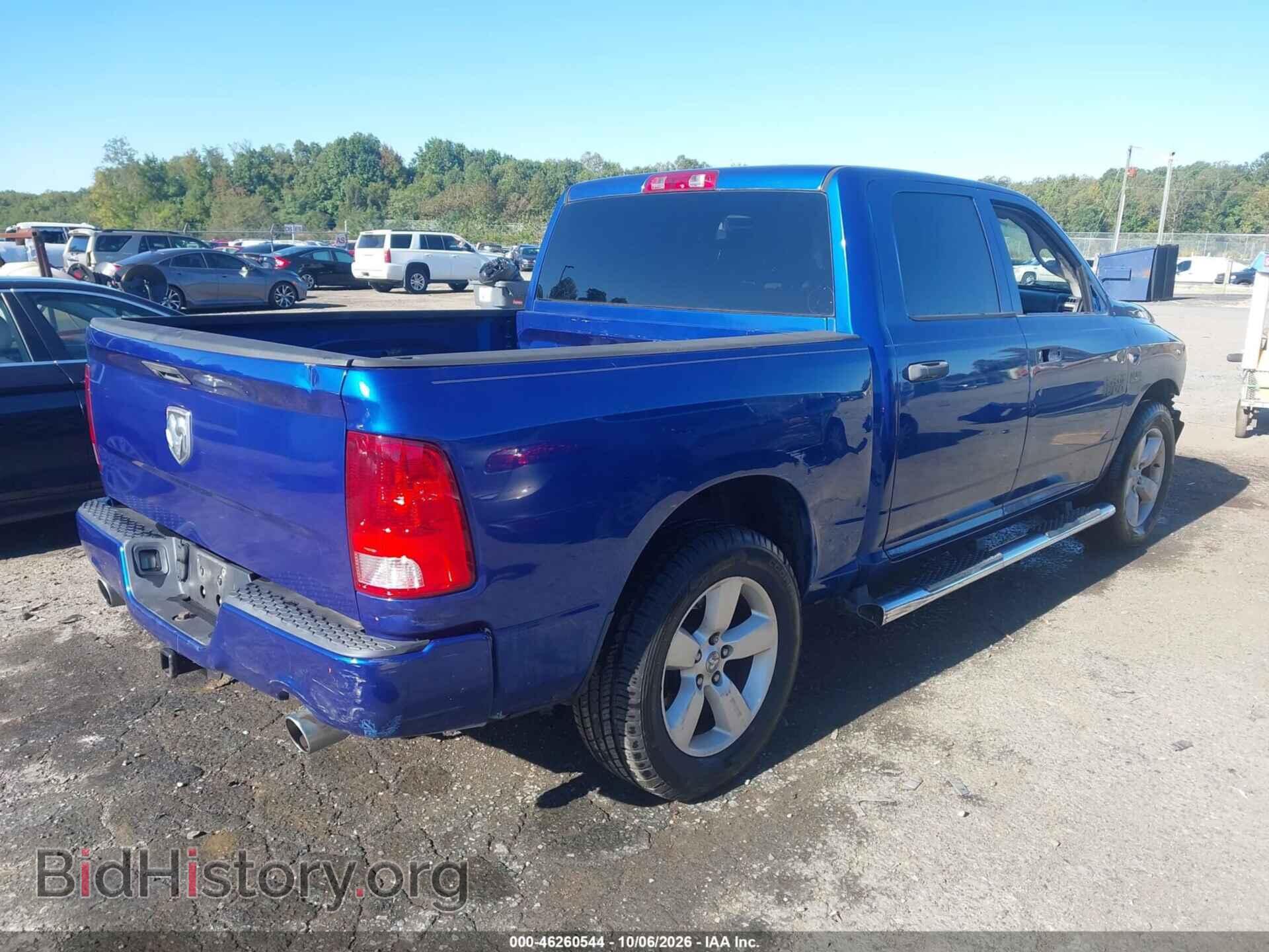2014 RAM 1500 (VIN 3C6RR6KT0EG331260) — фото 4 из 20