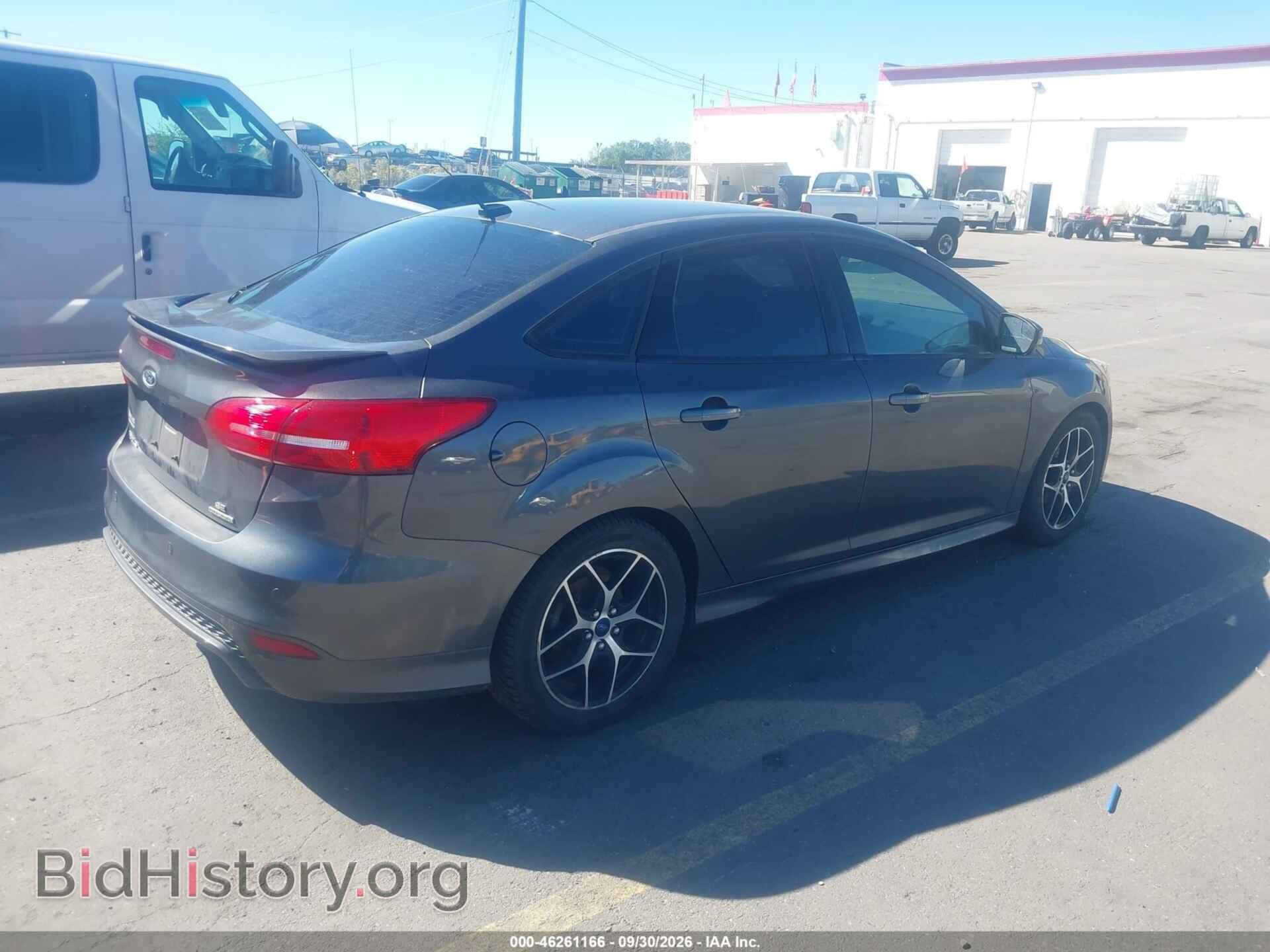 2015 FORD FOCUS - VIN: 1FADP3F27FL348429 - Photo 4