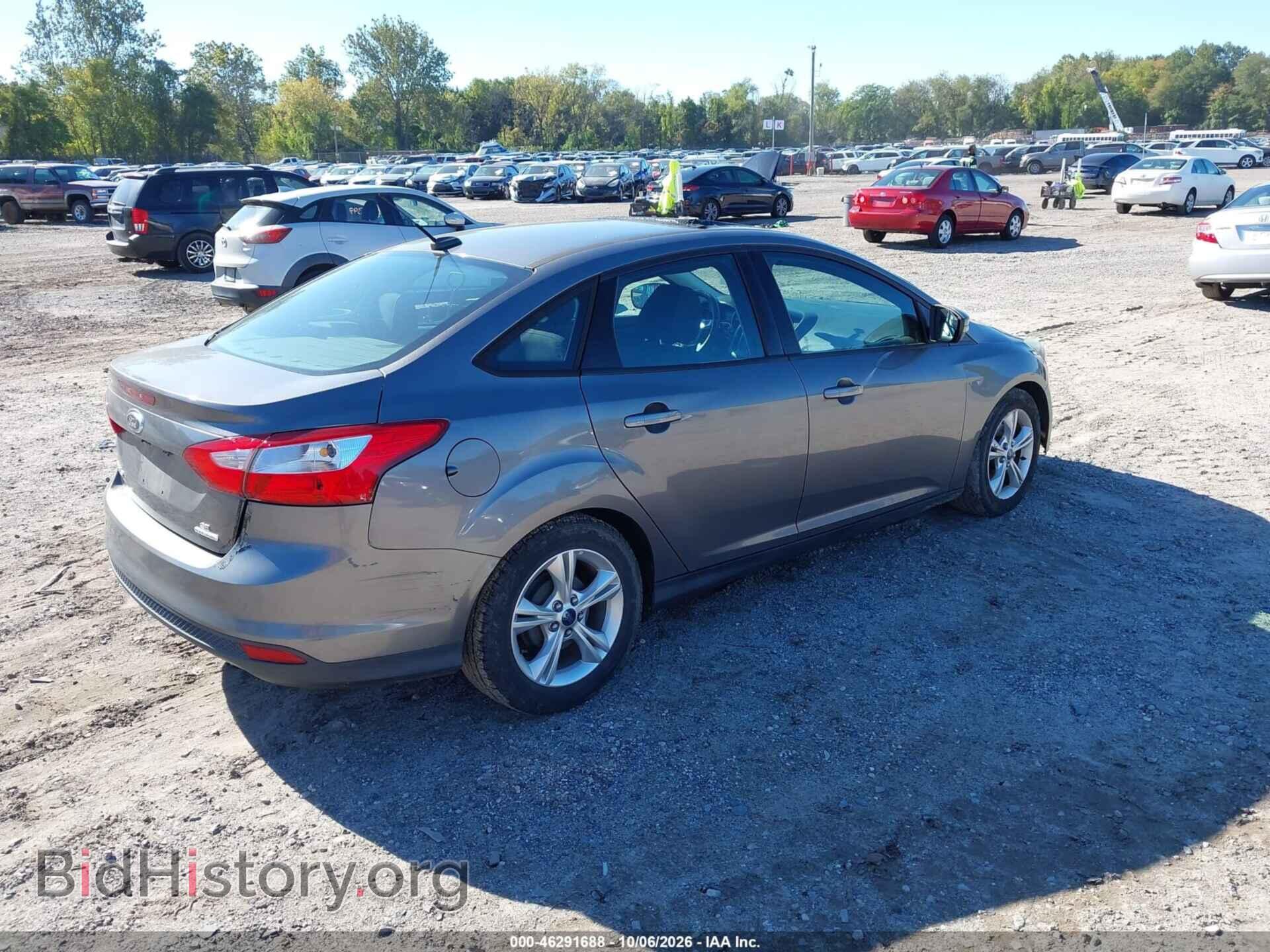 2014 FORD FOCUS - VIN: 1FADP3F23EL219828 - Photo 4