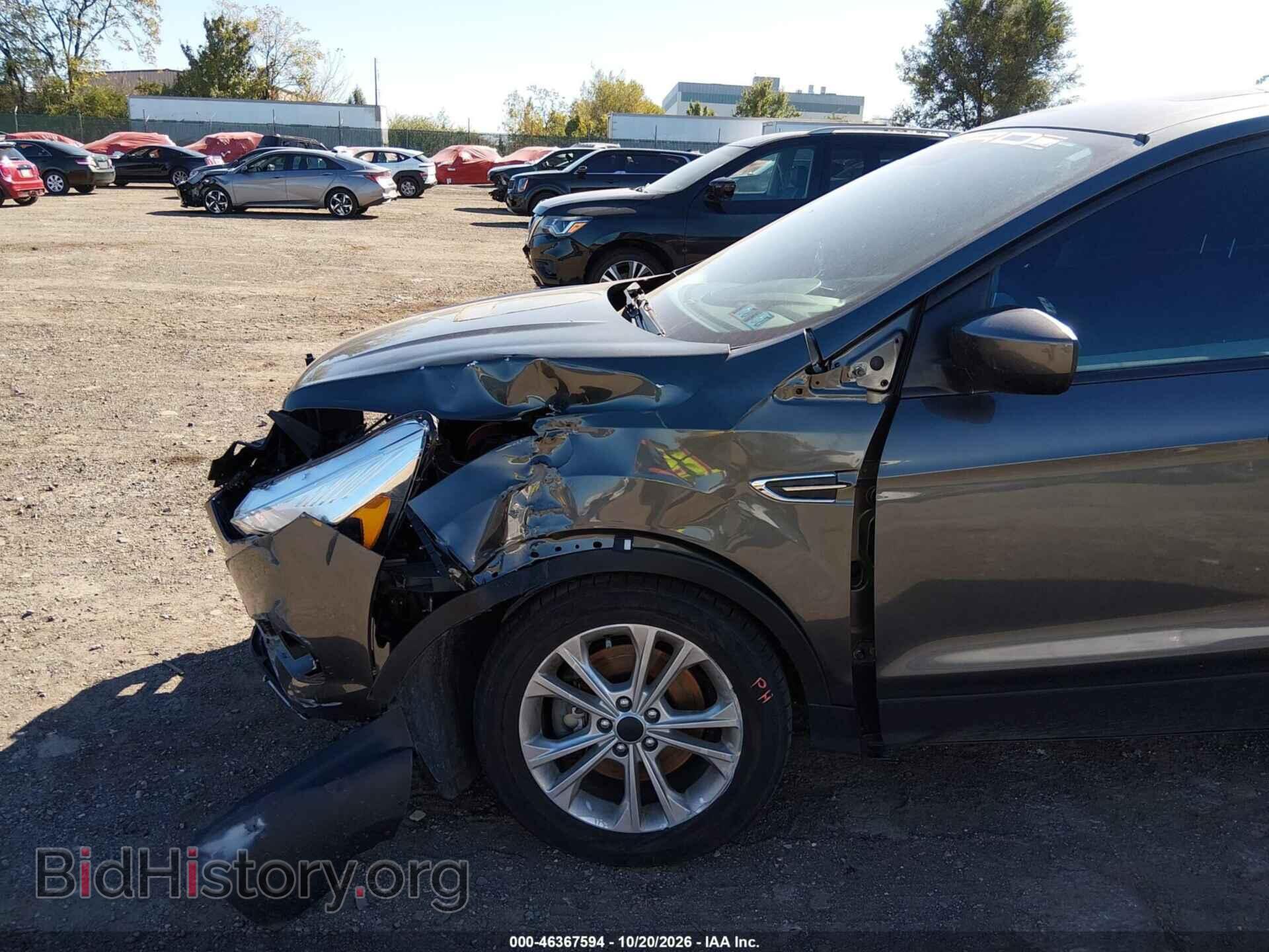 2017 Ford ESCAPE (VIN 1FMCU9G99HUD29662) — фото 12 из 14