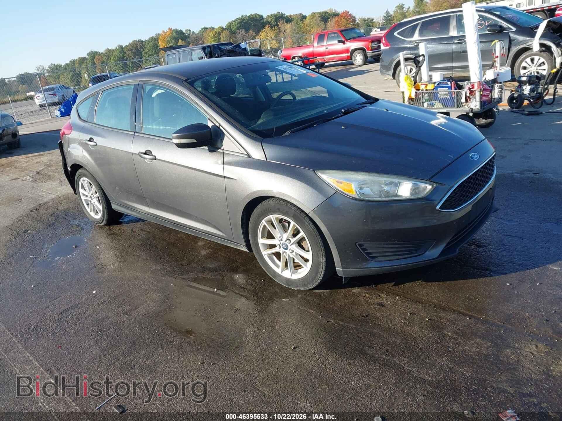 2015 Ford FOCUS SE (VIN 1FADP3K28FL286500) — photo 1 of 17, IAAI, damage: rear