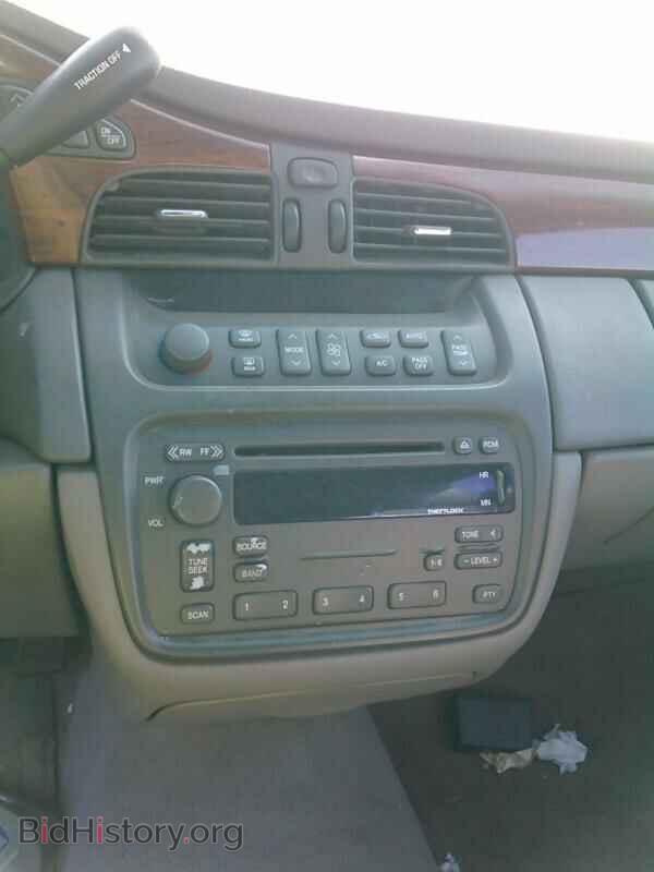 2004 Cadillac DeVille - VIN: 1G6KD54Y84U207487 - Photo 4