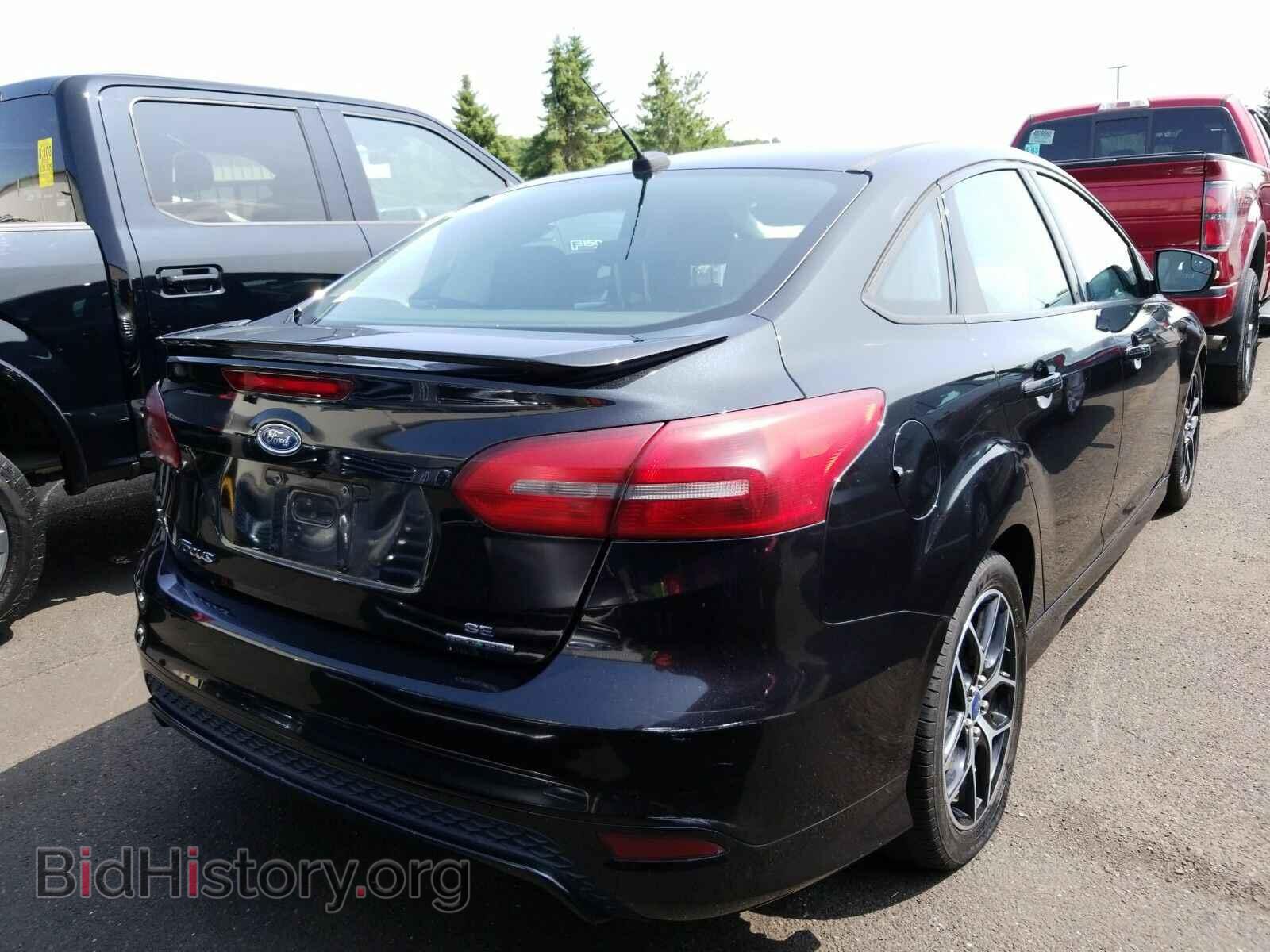 2015 Ford Focus - VIN: 1FADP3F21FL215357 - Фото 2
